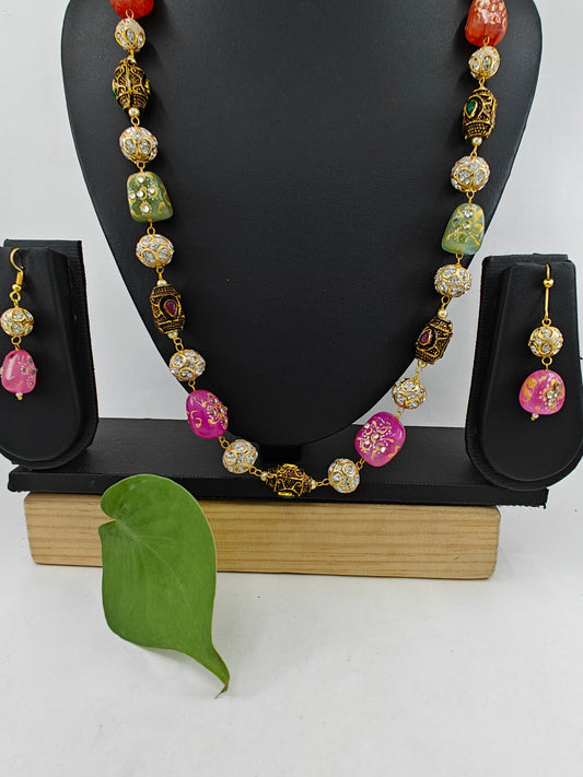 Bead necklace with pink green,orange worked upon beads and metal beads