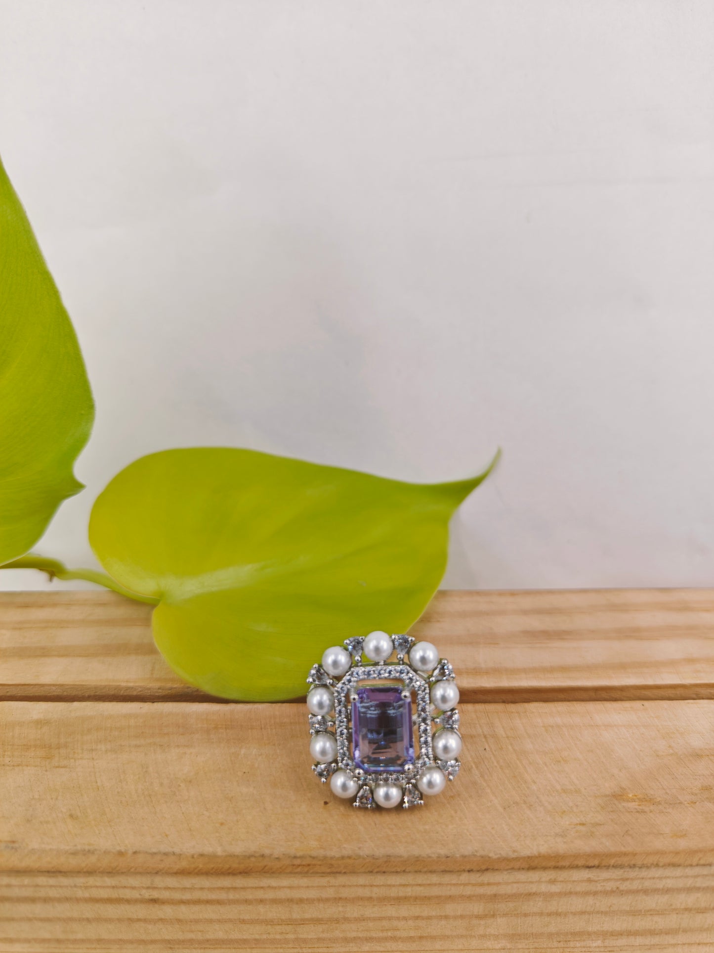 Silver finish amethyst rectangular ring surrounded with CZ and pearls