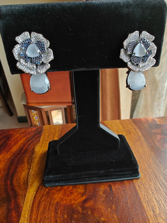 Open flower earrings with aquamarine-green/grey-blue nano stones with CZ highlights