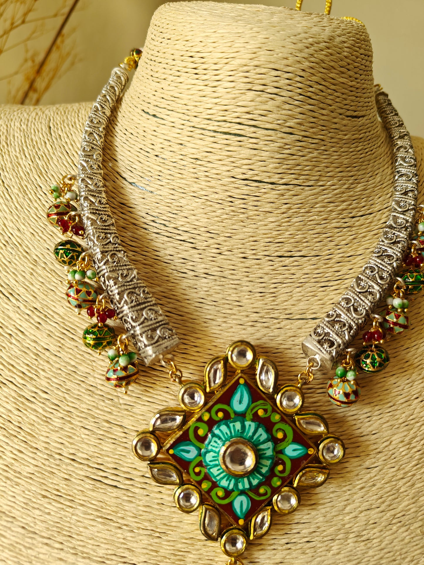 Hasili set in silver finish with Meenakari,stone and kundan work,big meenakari earrings