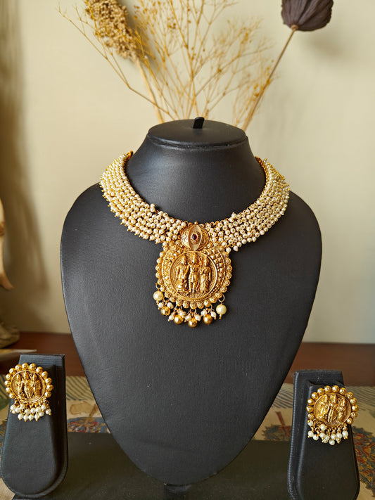 Gold temple jewelry,a Ram darbar pendant on pearl clusters