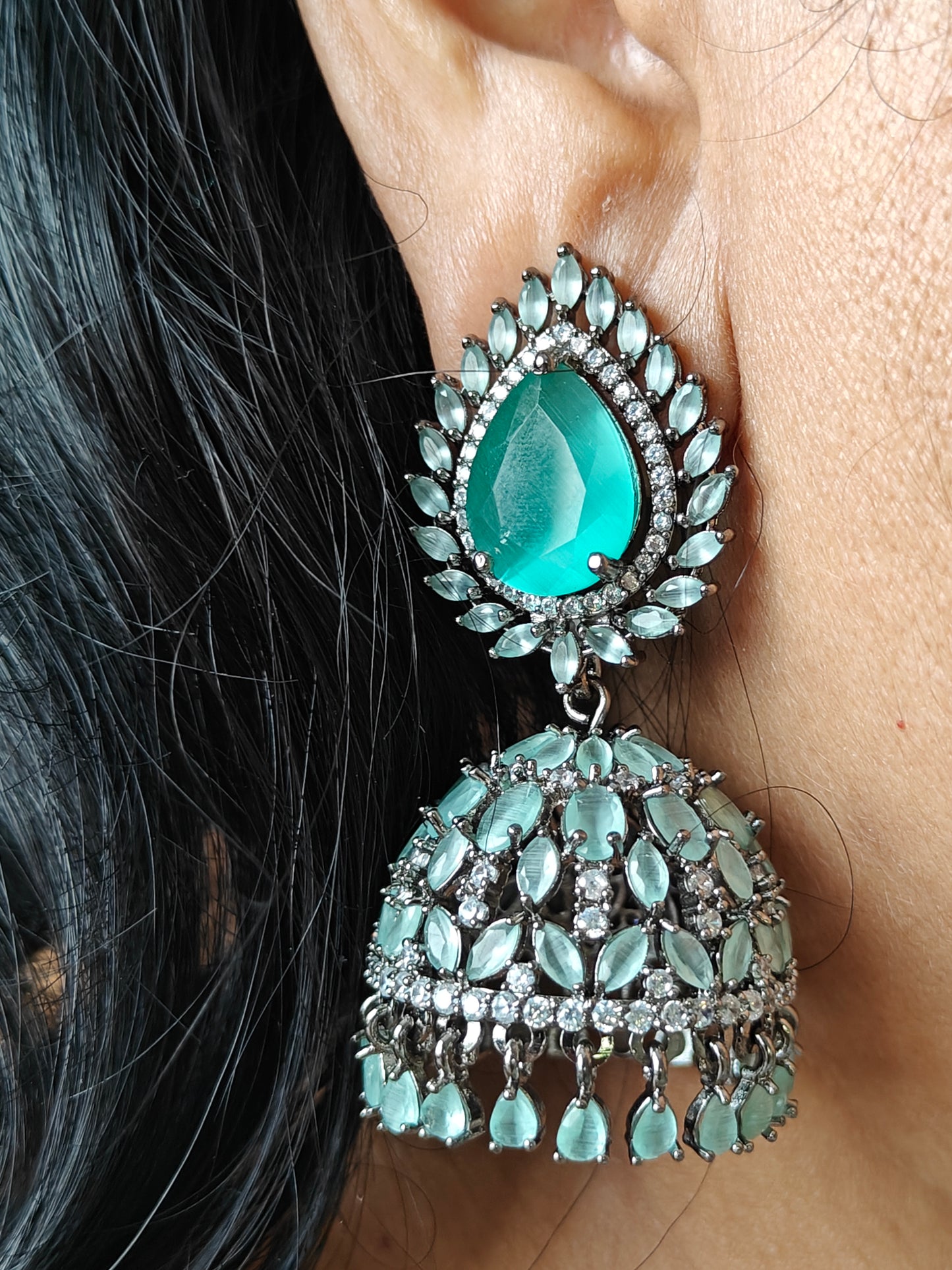 Chandelier jhumkas in mint green/champagne colour