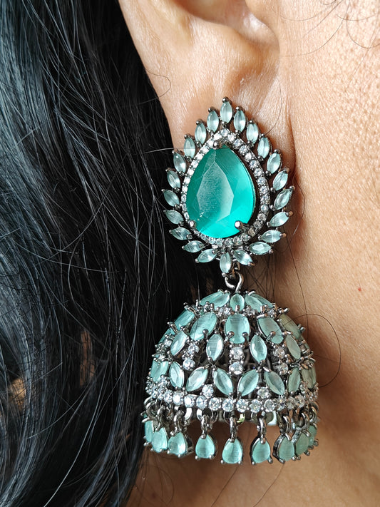 Chandelier jhumkas in mint green/champagne colour