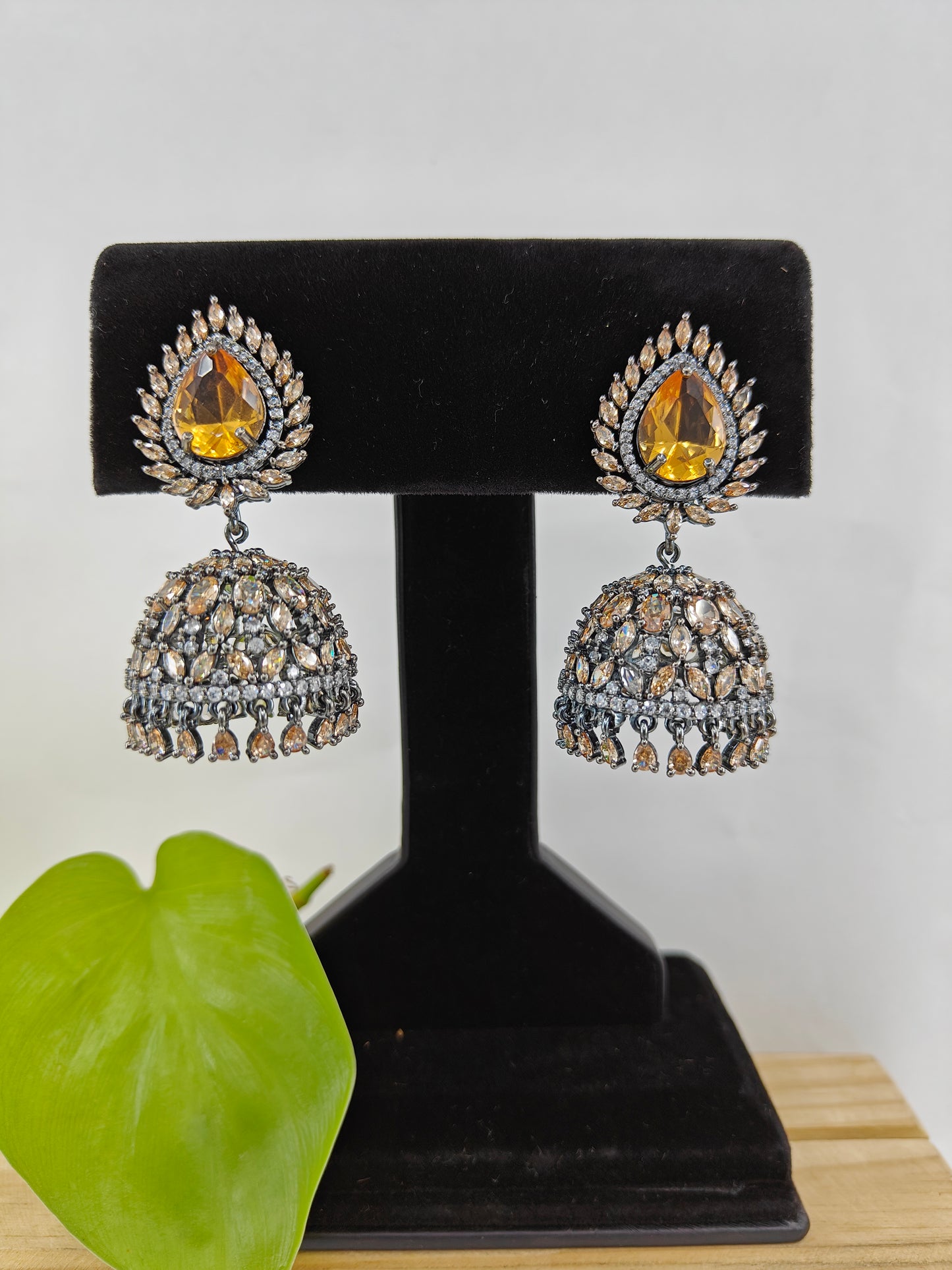 Chandelier jhumkas in mint green/champagne colour