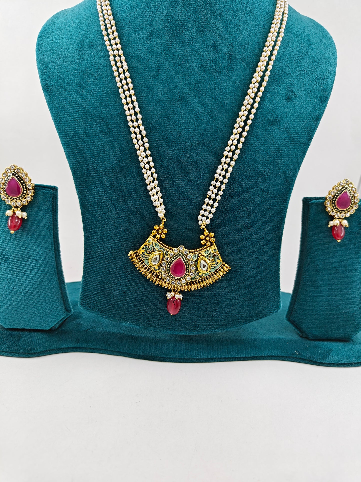 Meenakari and kundan set with stone work on pearl strands