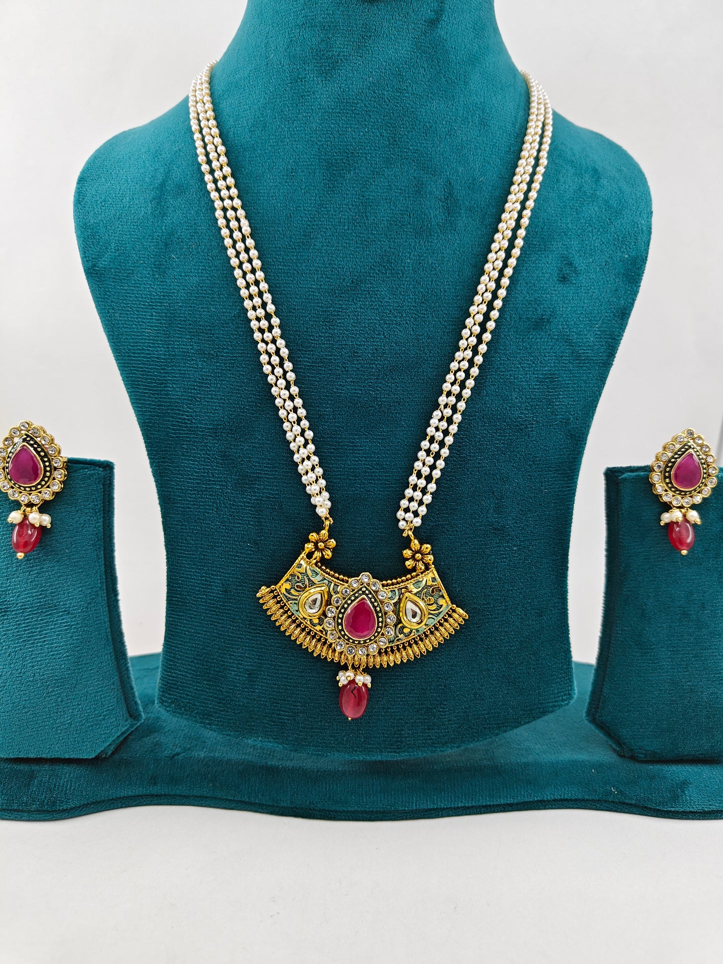 Meenakari and kundan set with stone work on pearl strands