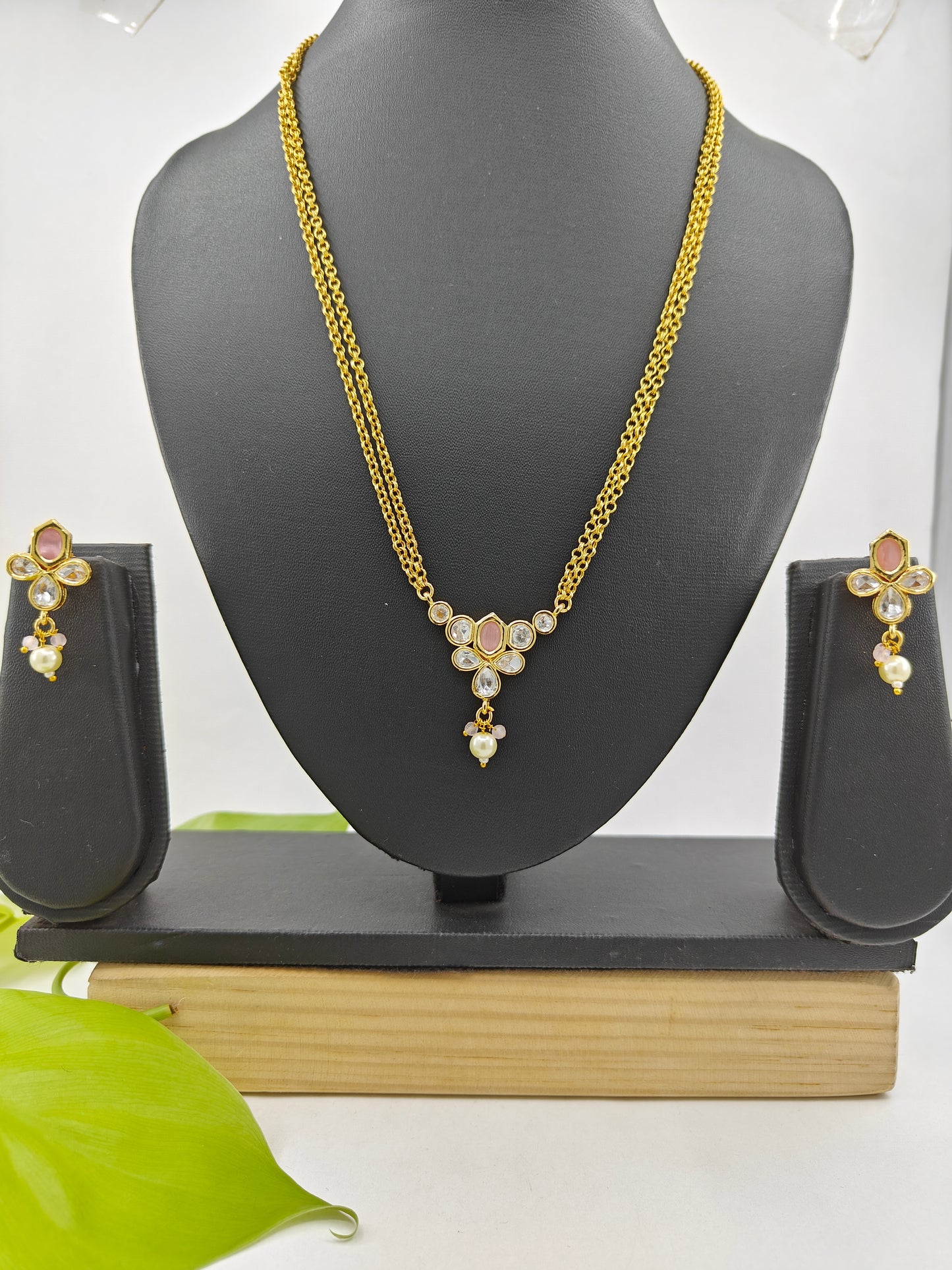 Set with kundan and mint green/baby pink pendant on double gold chains