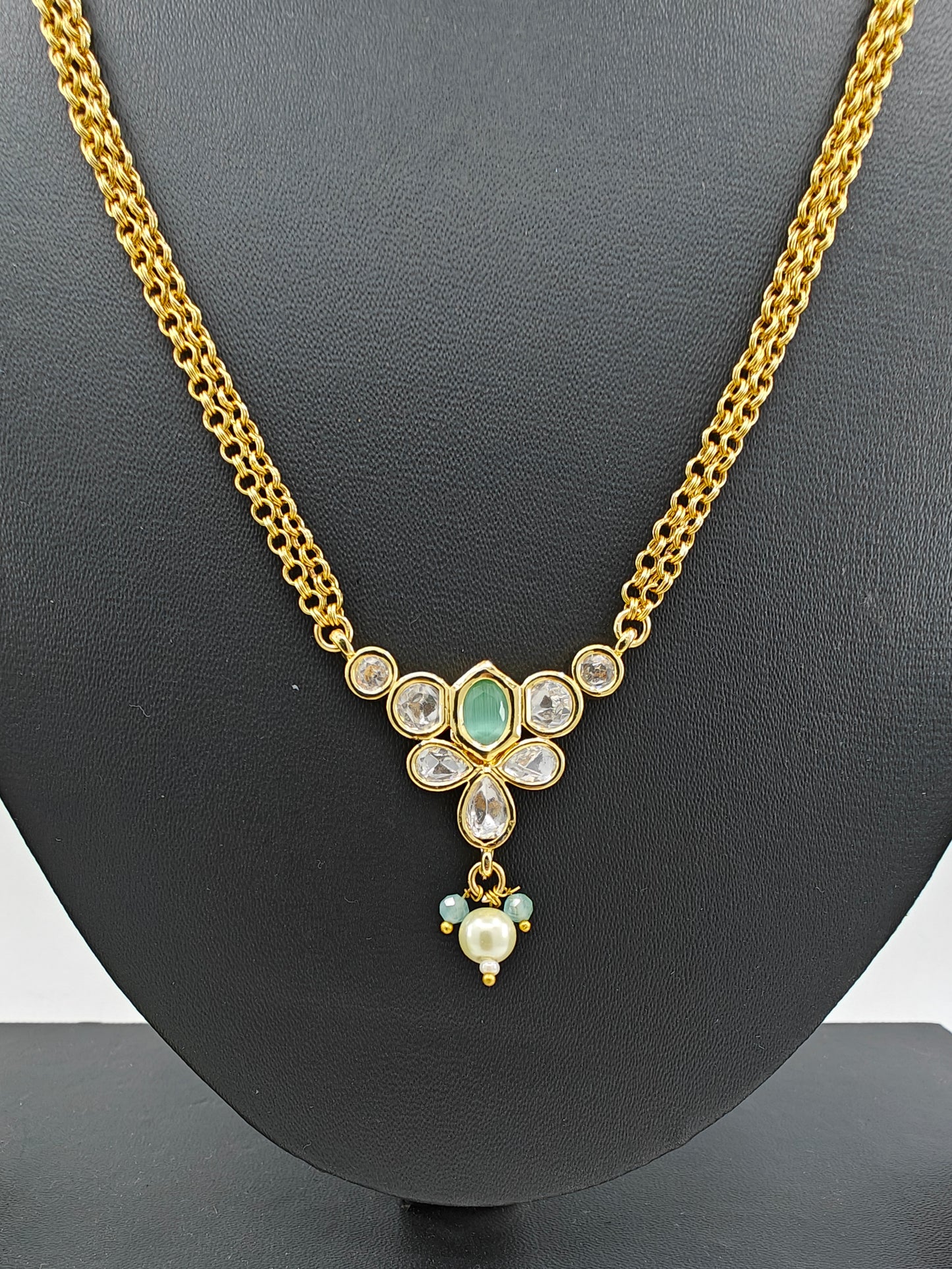 Set with kundan and mint green/baby pink pendant on double gold chains