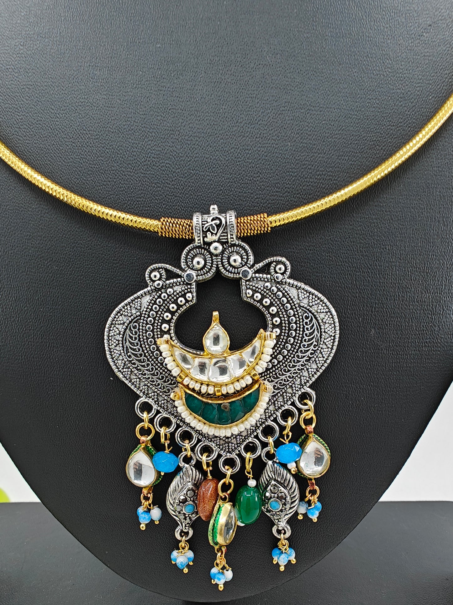 Dual tone golden pipe hasli with silver finish pendant with pachi kundan and stone work