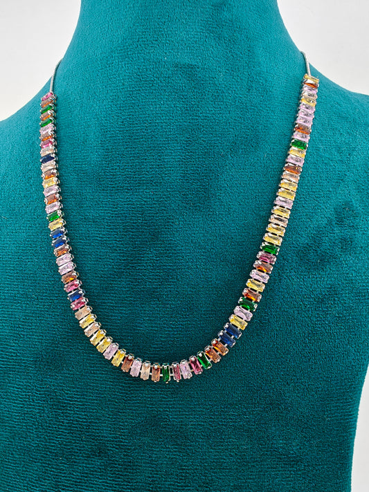 Necklace in platinum/rose gold finish with baguette stones in multicolour / CZ