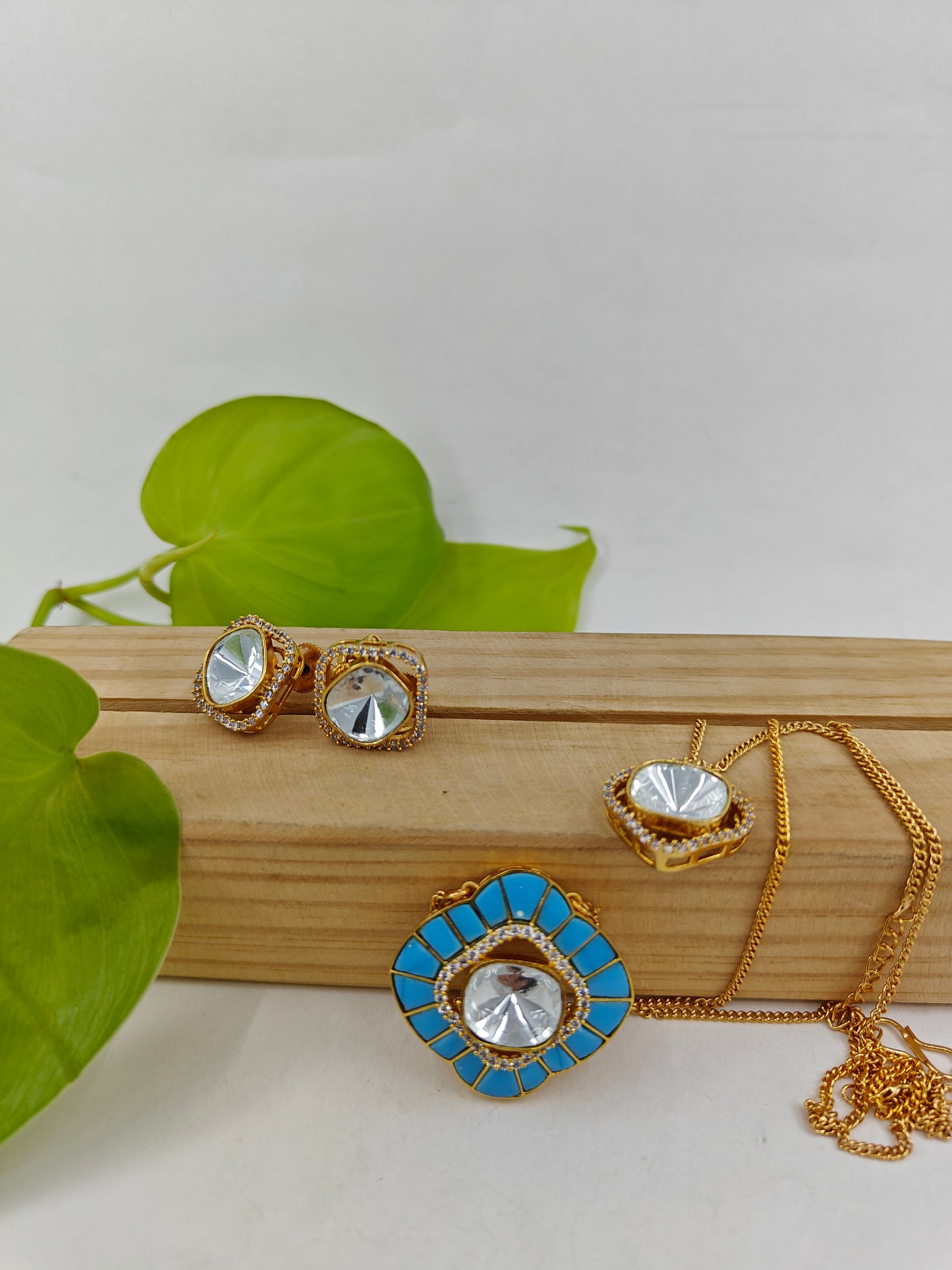 Two chains and two pendant set with Kundan and Turquoise blue/Light peach/Mint green colour stone