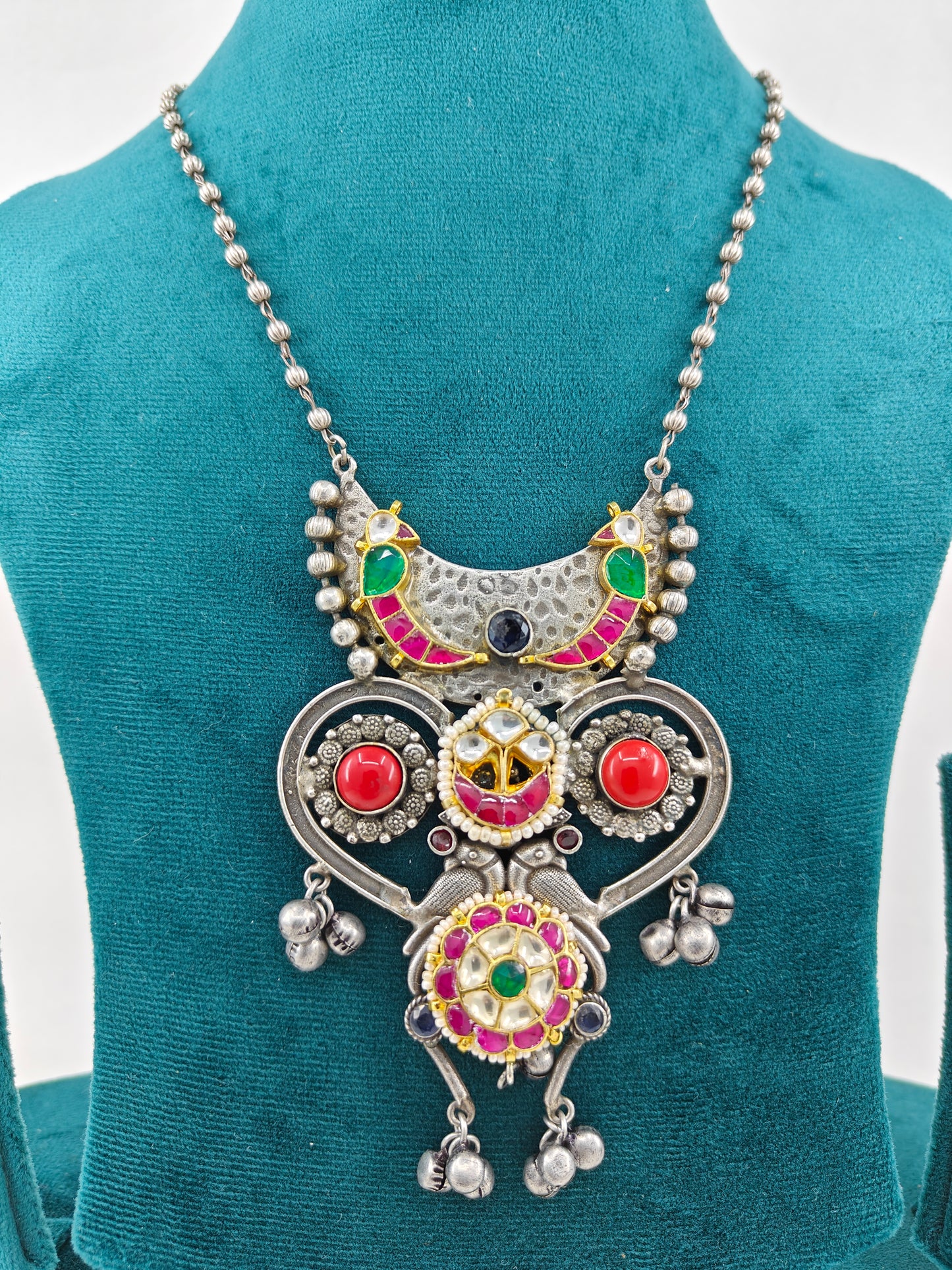 Necklace with peacock motifs and stone work with kundan and pearls