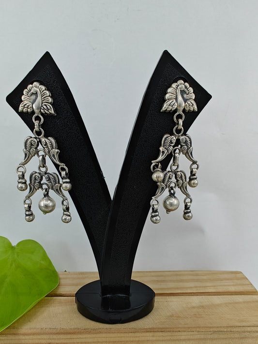 Silver earrings with multiple peacocks