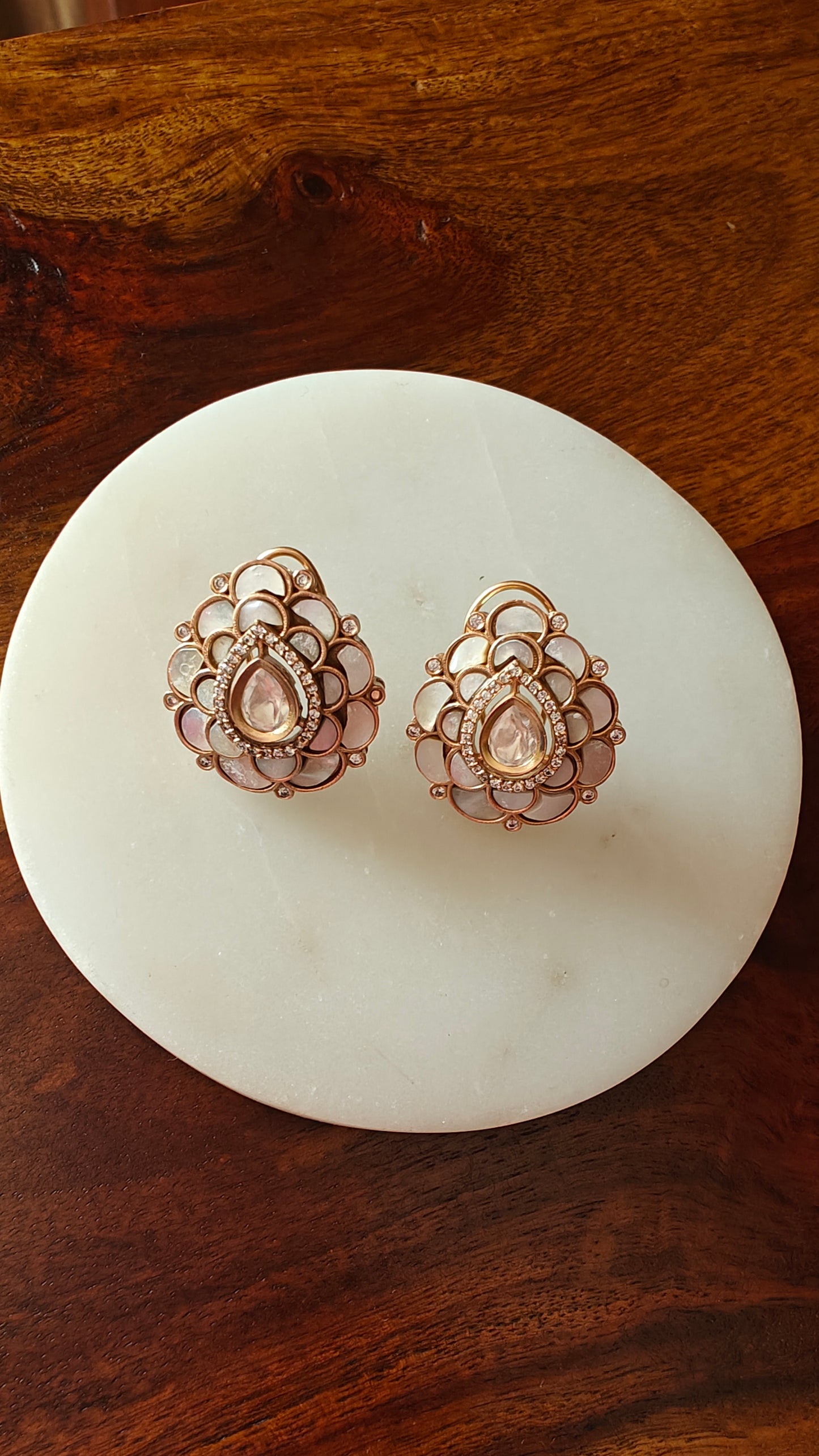 Oval shaped studs (earrings) with Firoza/ mother of pearl petals