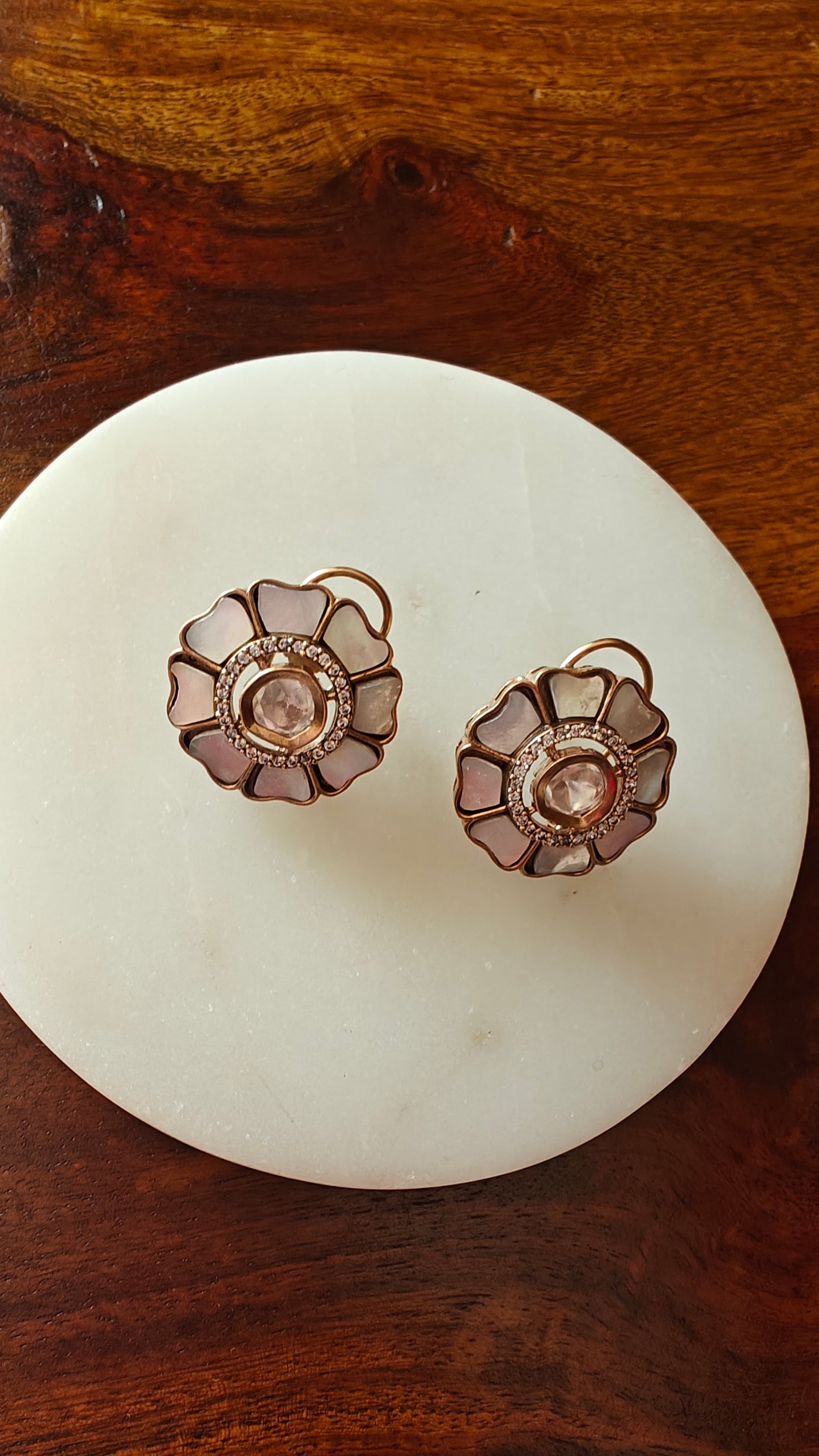 Golden studs with flower petals in multi colour stones/mother of pearl