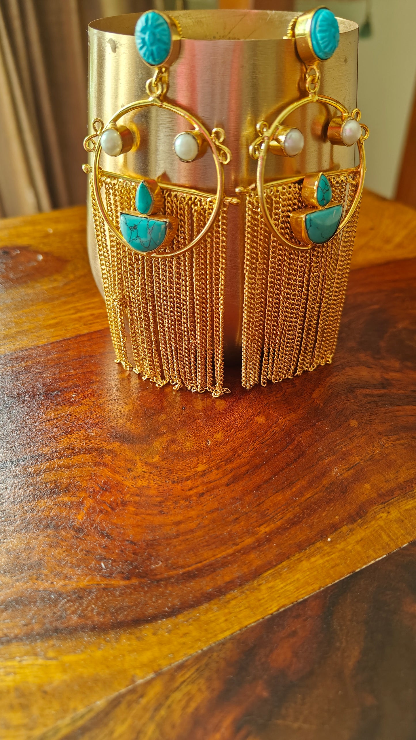 Gold sheer earrings with turquoise stones