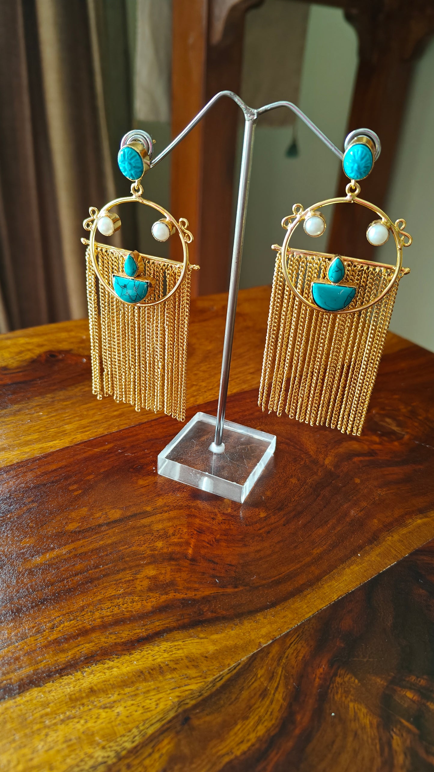 Gold sheer earrings with turquoise stones