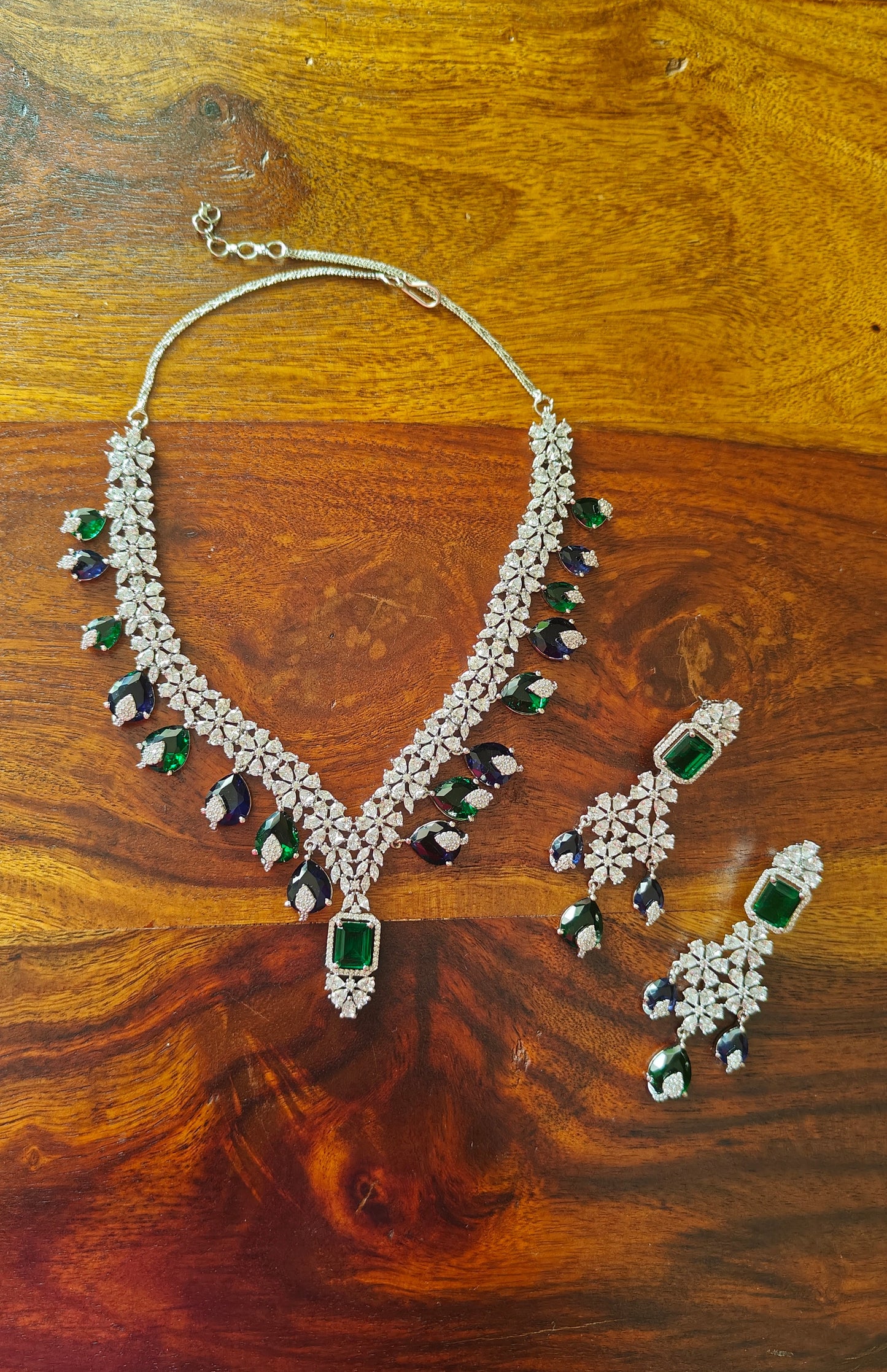 Benazir set with alternating emerald green and sapphire stone drops