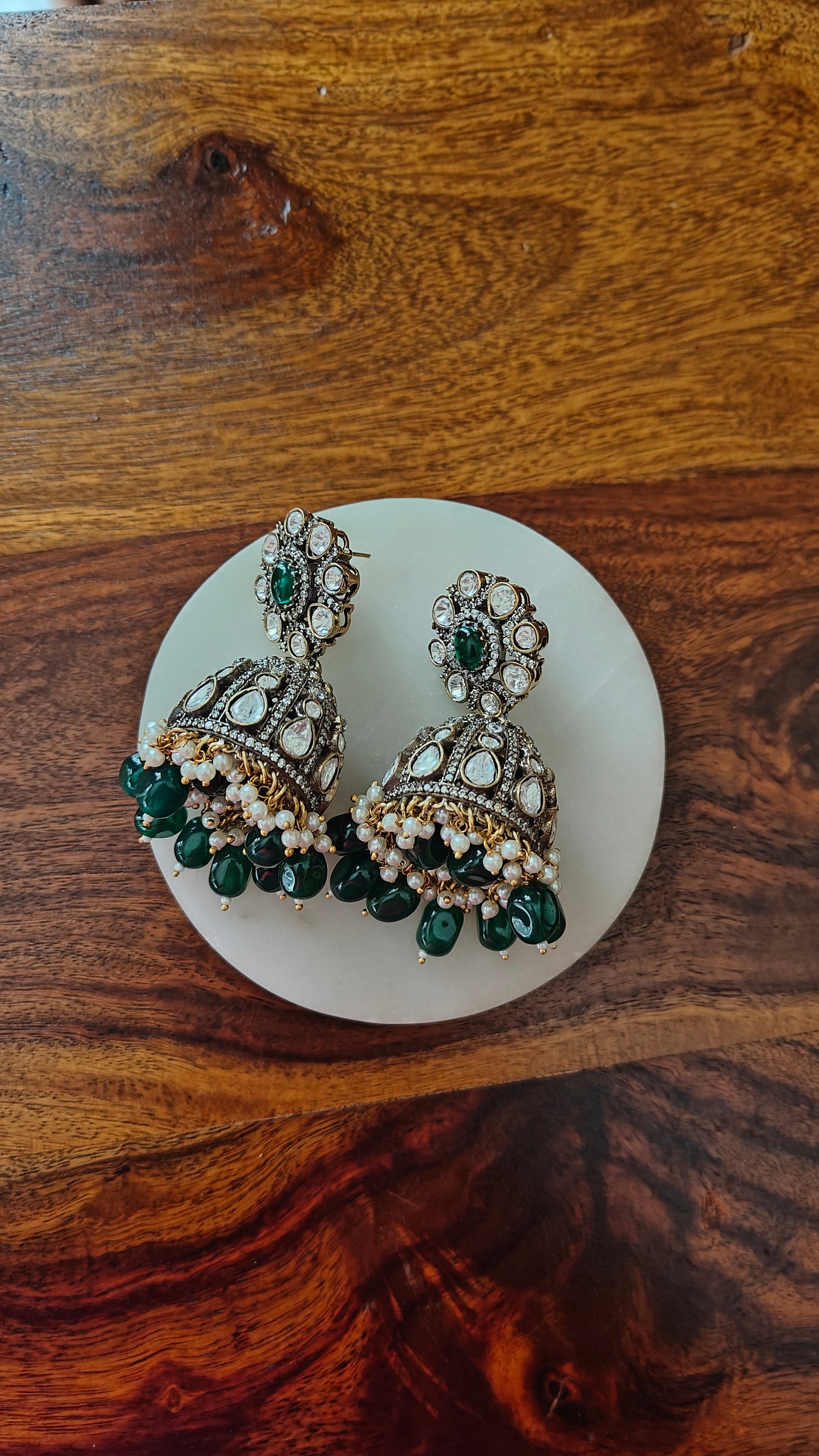 Anmol earrings with kundan and emerald