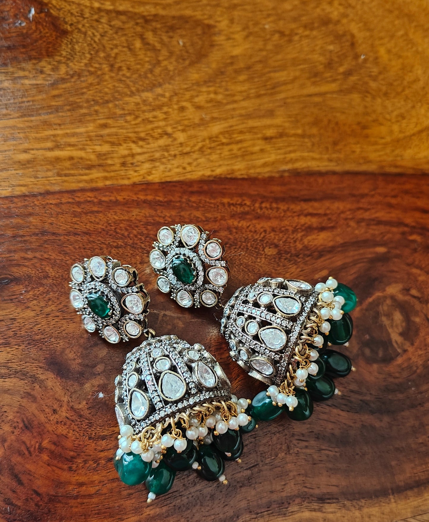 Anmol earrings with kundan and emerald