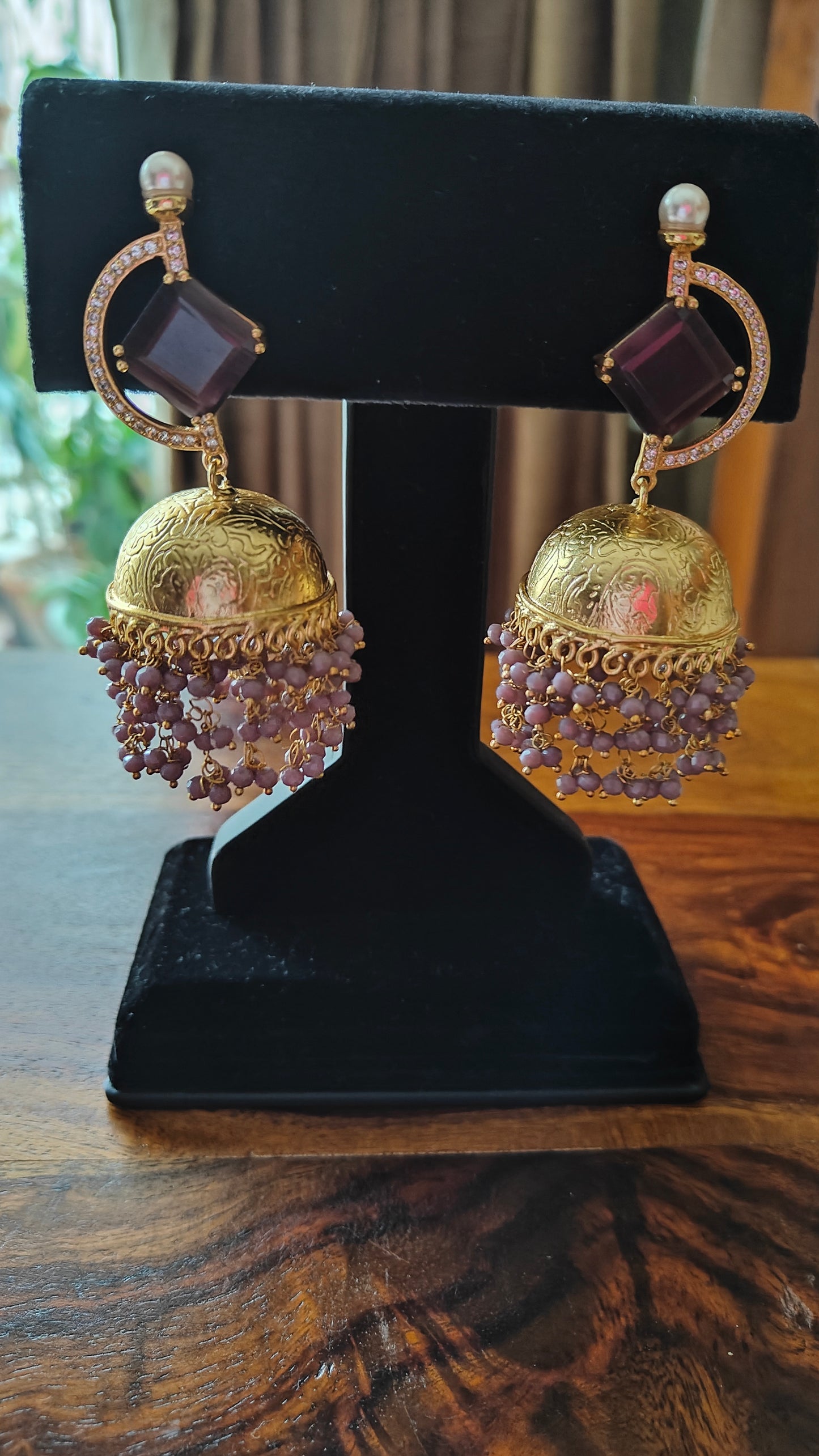 Golden jhumkas(earrings)with stone on D shaped stud