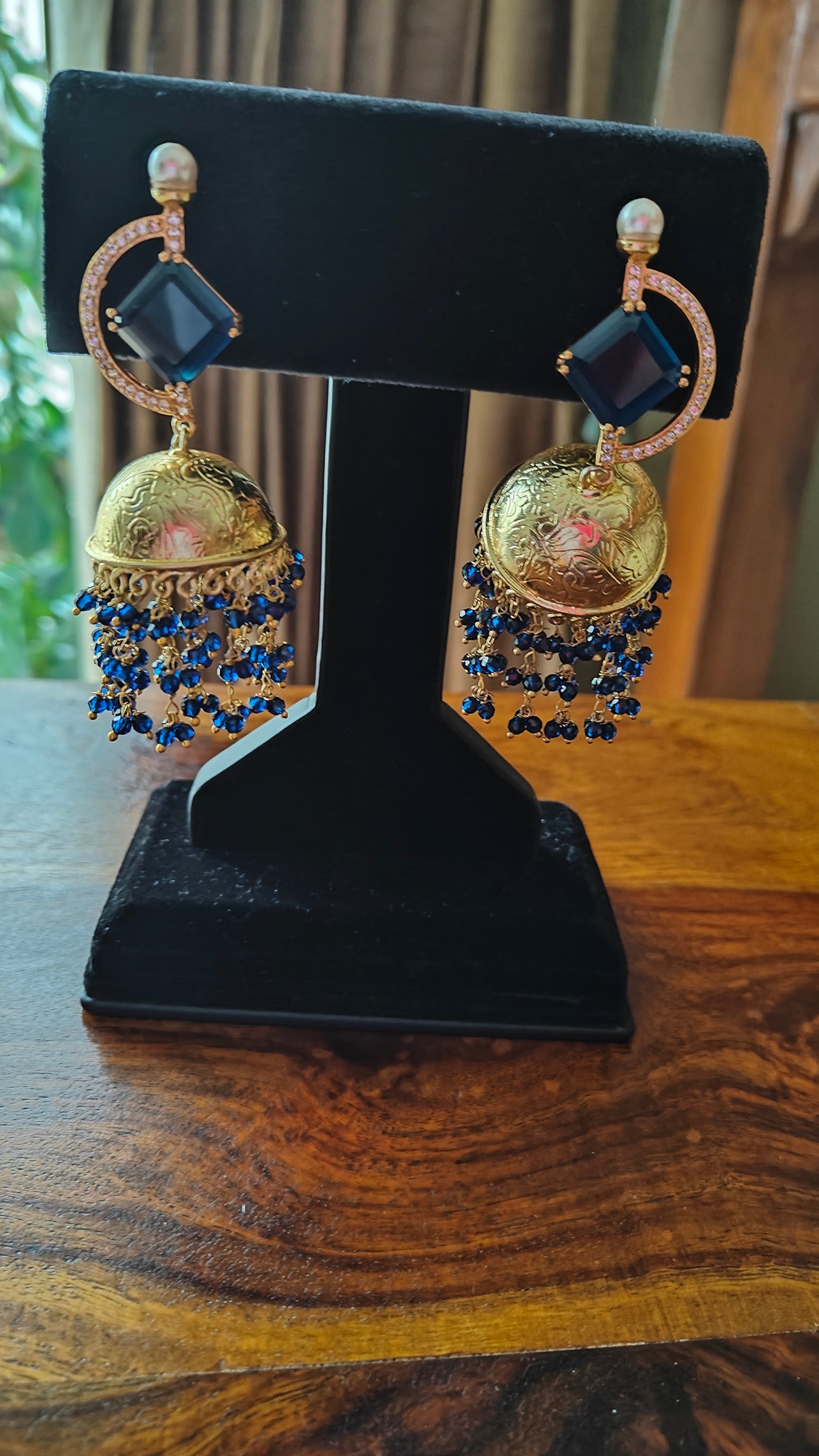 Golden jhumkas(earrings)with stone on D shaped stud