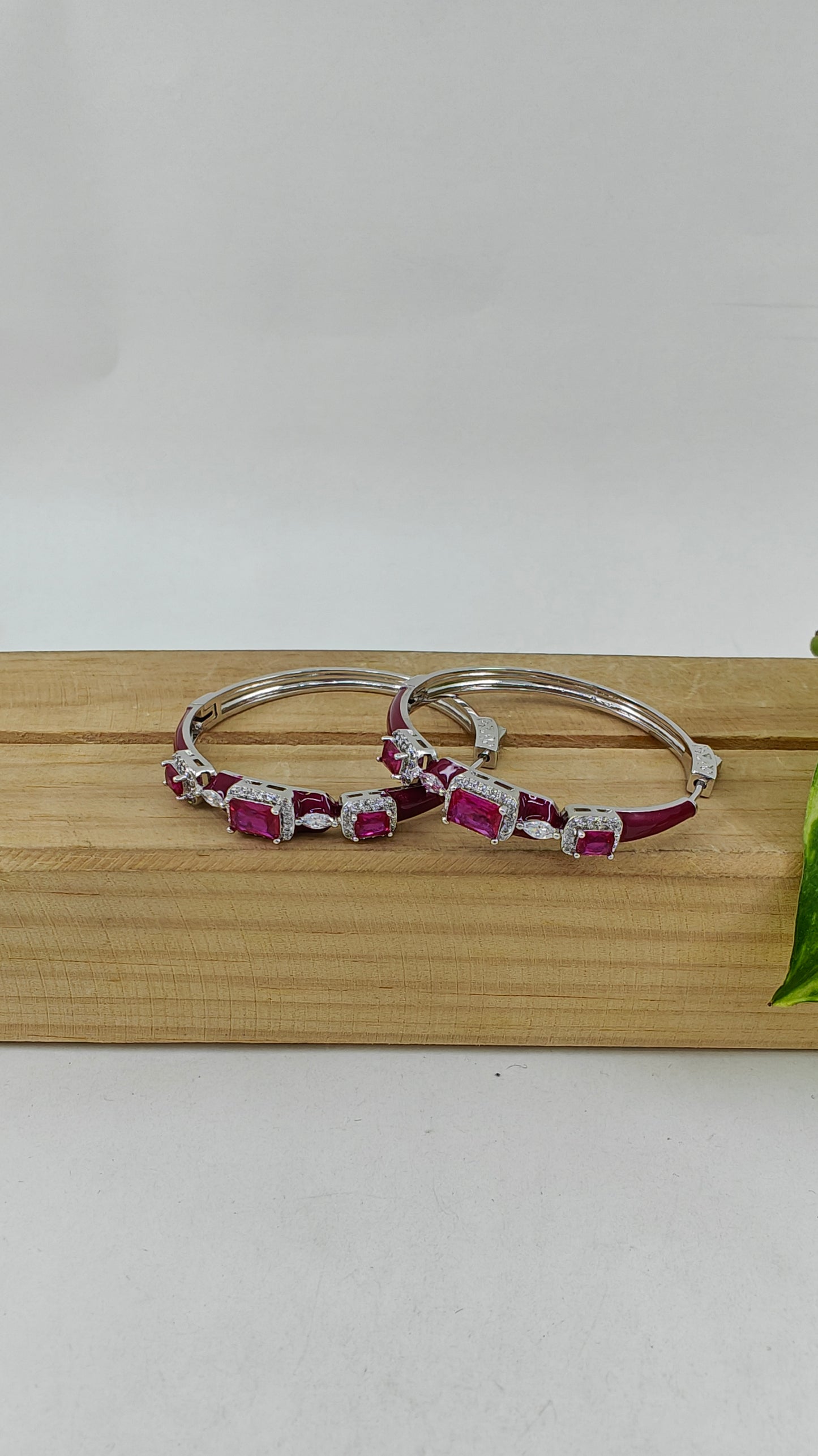 Hoop earrings with ruby pink/ sapphire stones