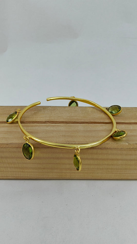 Bangle with stone hangings