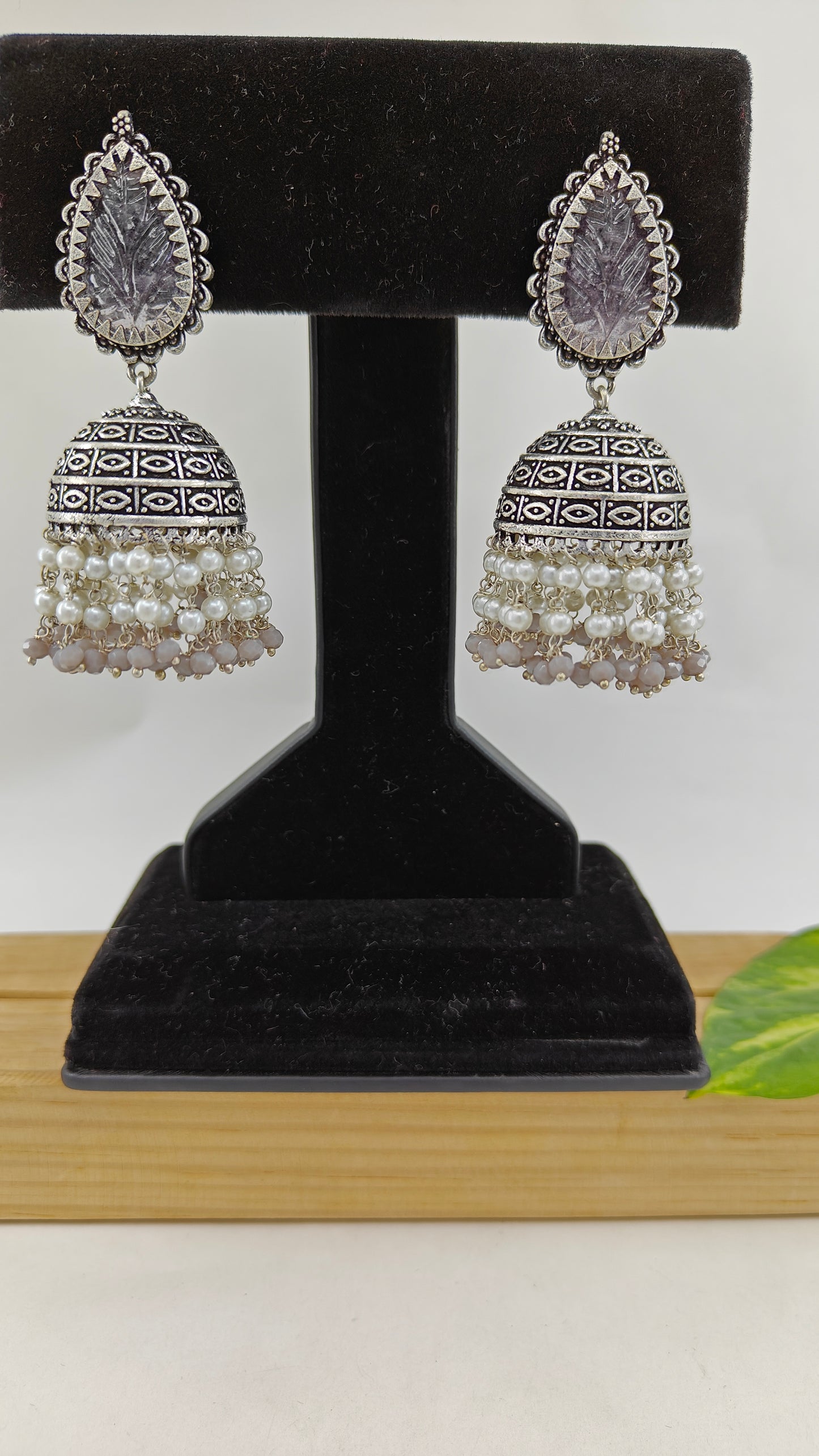 Silver finish jhumkas(earrings)with pearl and coloured stone hangings