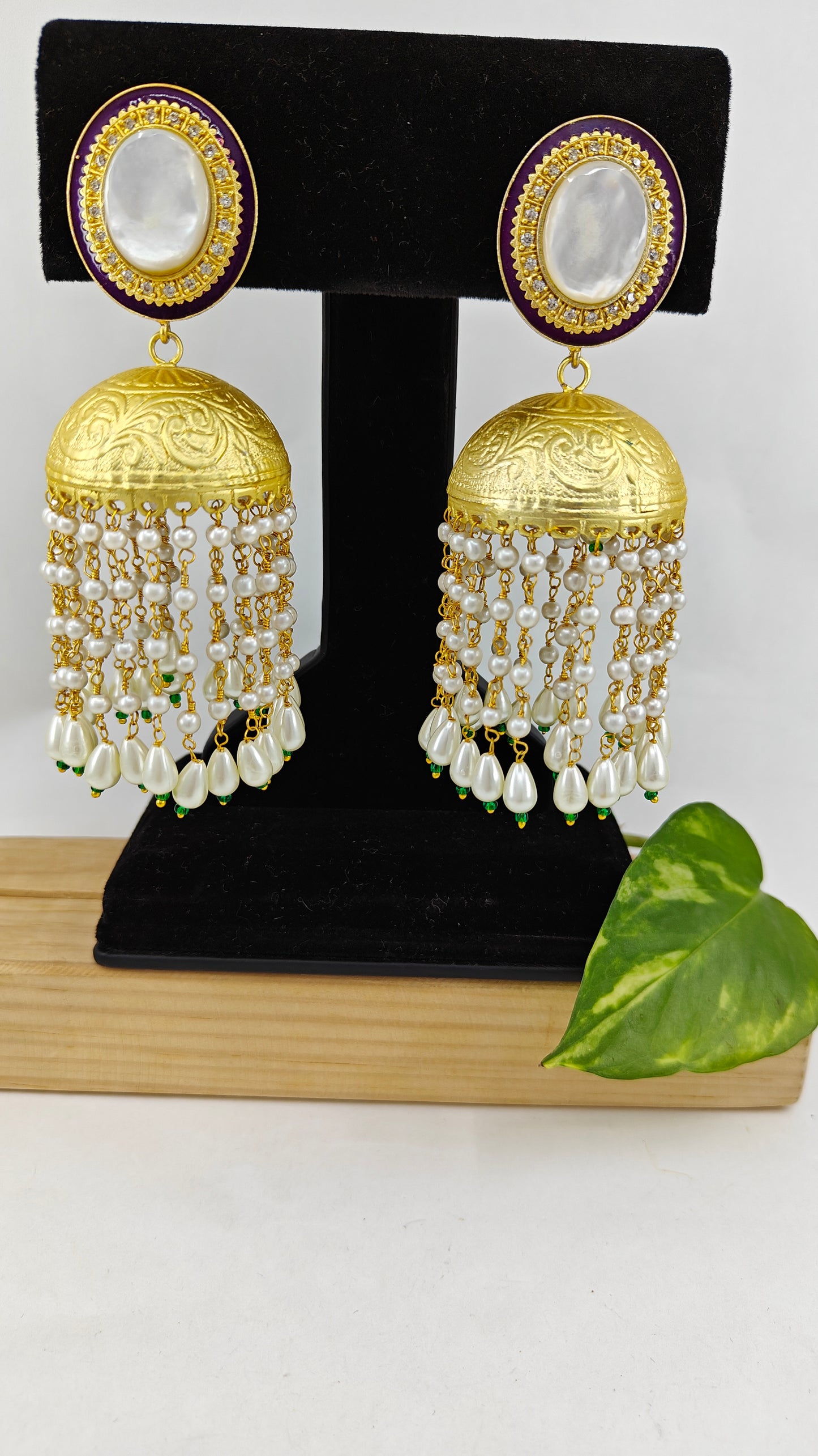 Golden jhumkas with Long pearl hangings