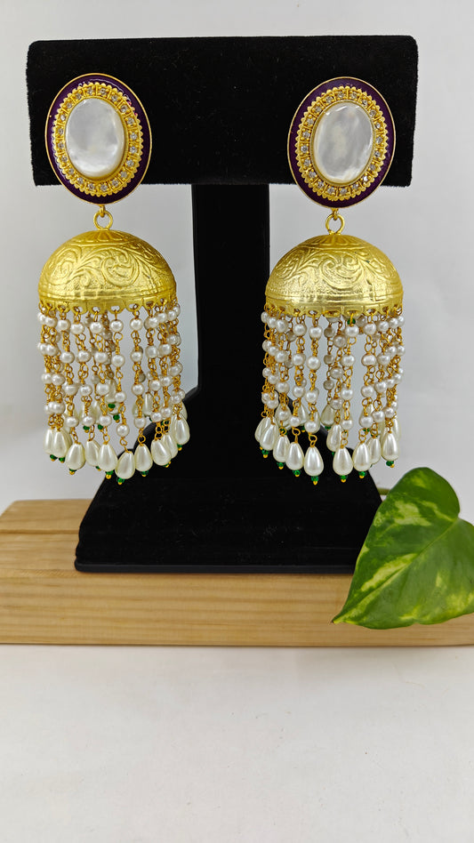 Golden jhumkas with Long pearl hangings