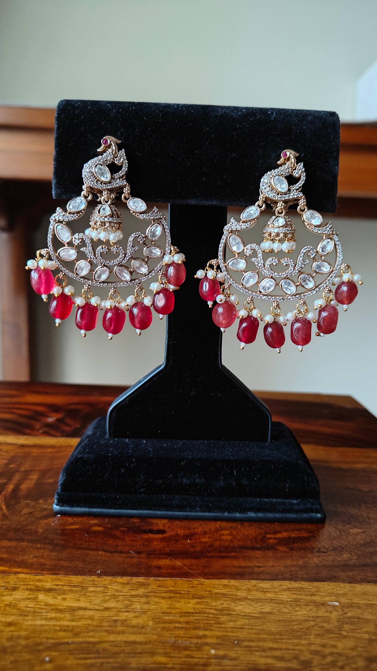 Ahana earrings with Bali in centre of peacock motif