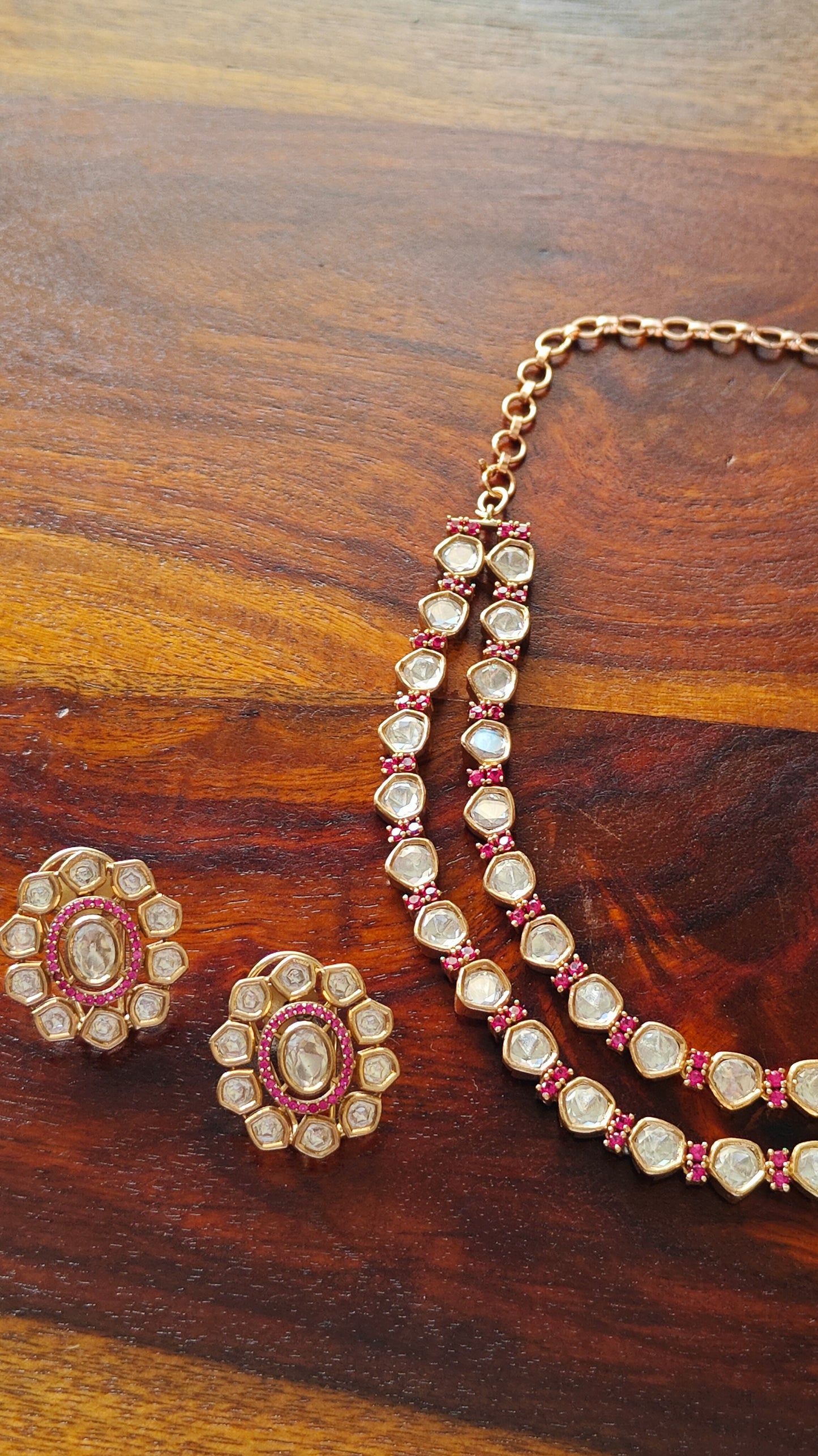 Anika set in Kundan and ruby/emerald stones