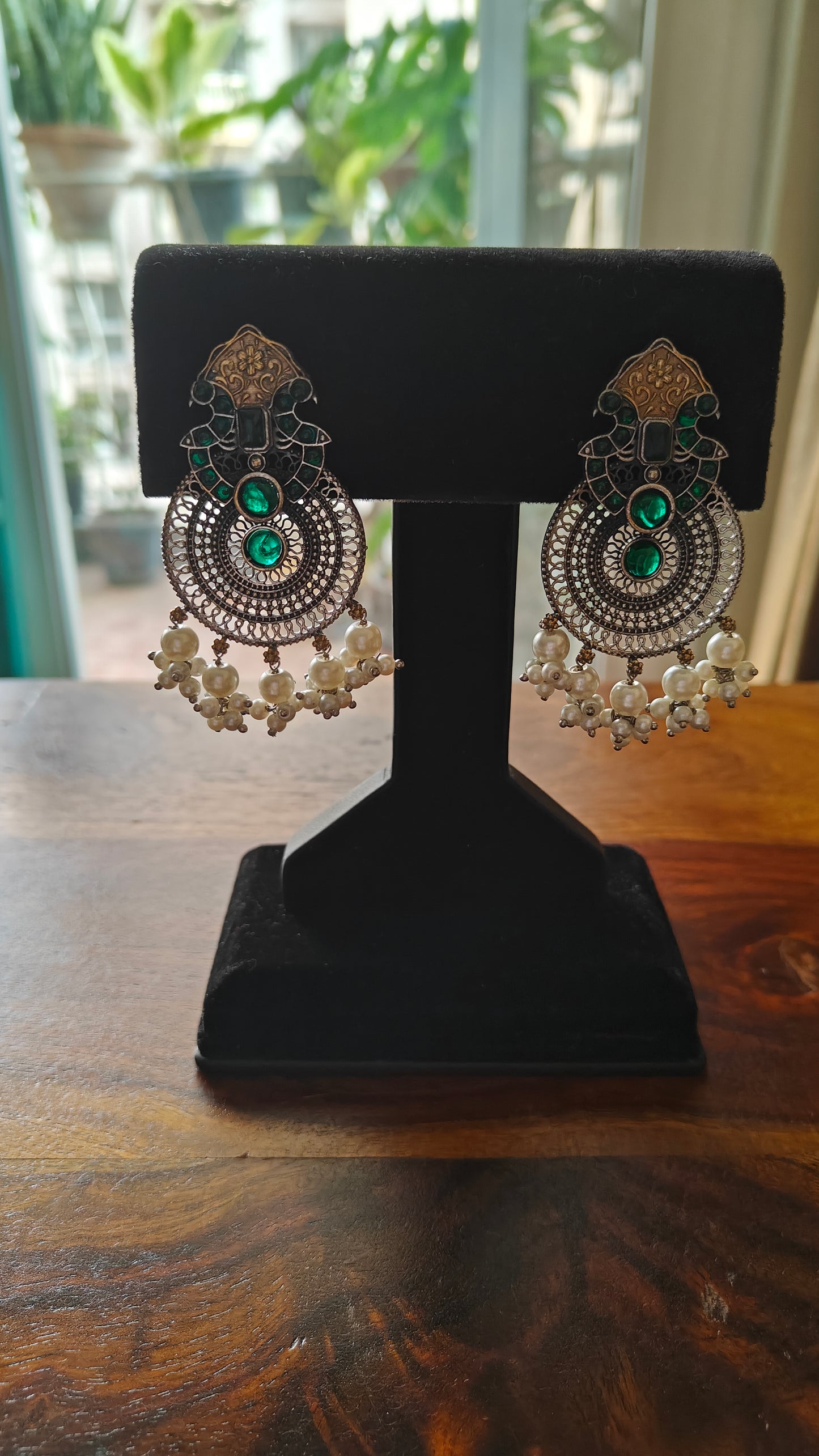 Dual tone peacock earrings with stone