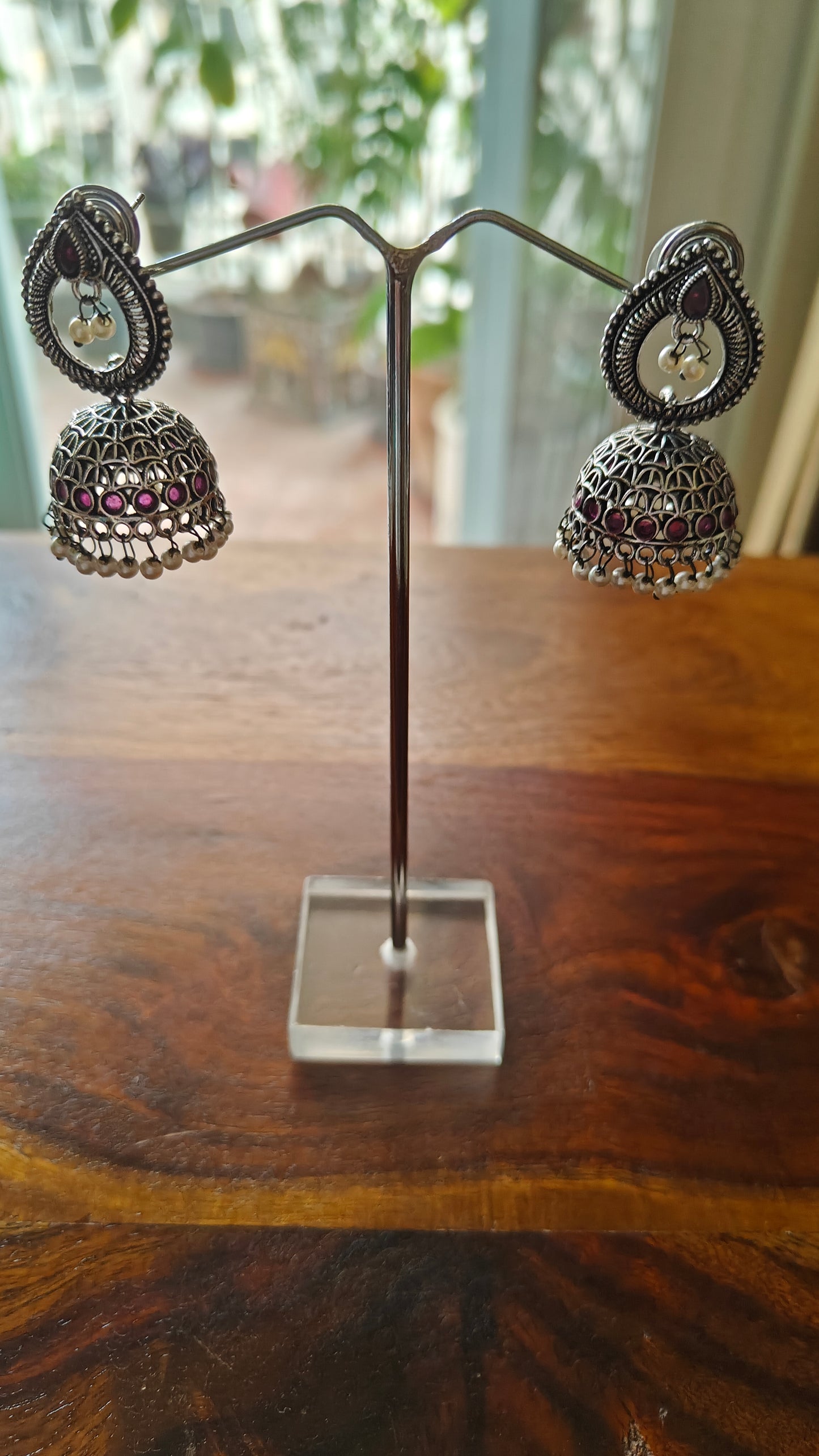 Jhumkis on teardrop stud with pearls