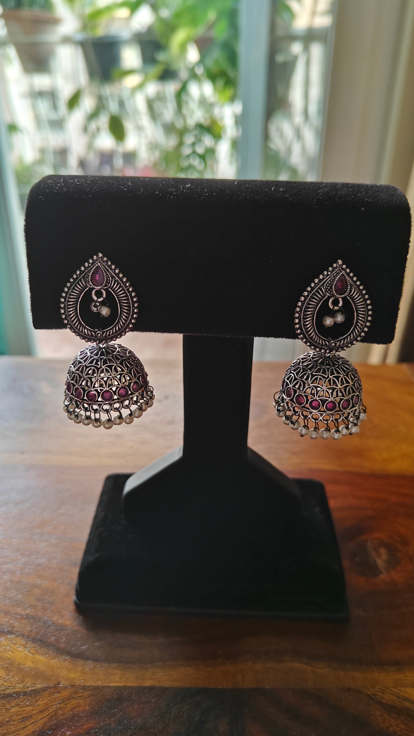 Jhumkis on teardrop stud with pearls