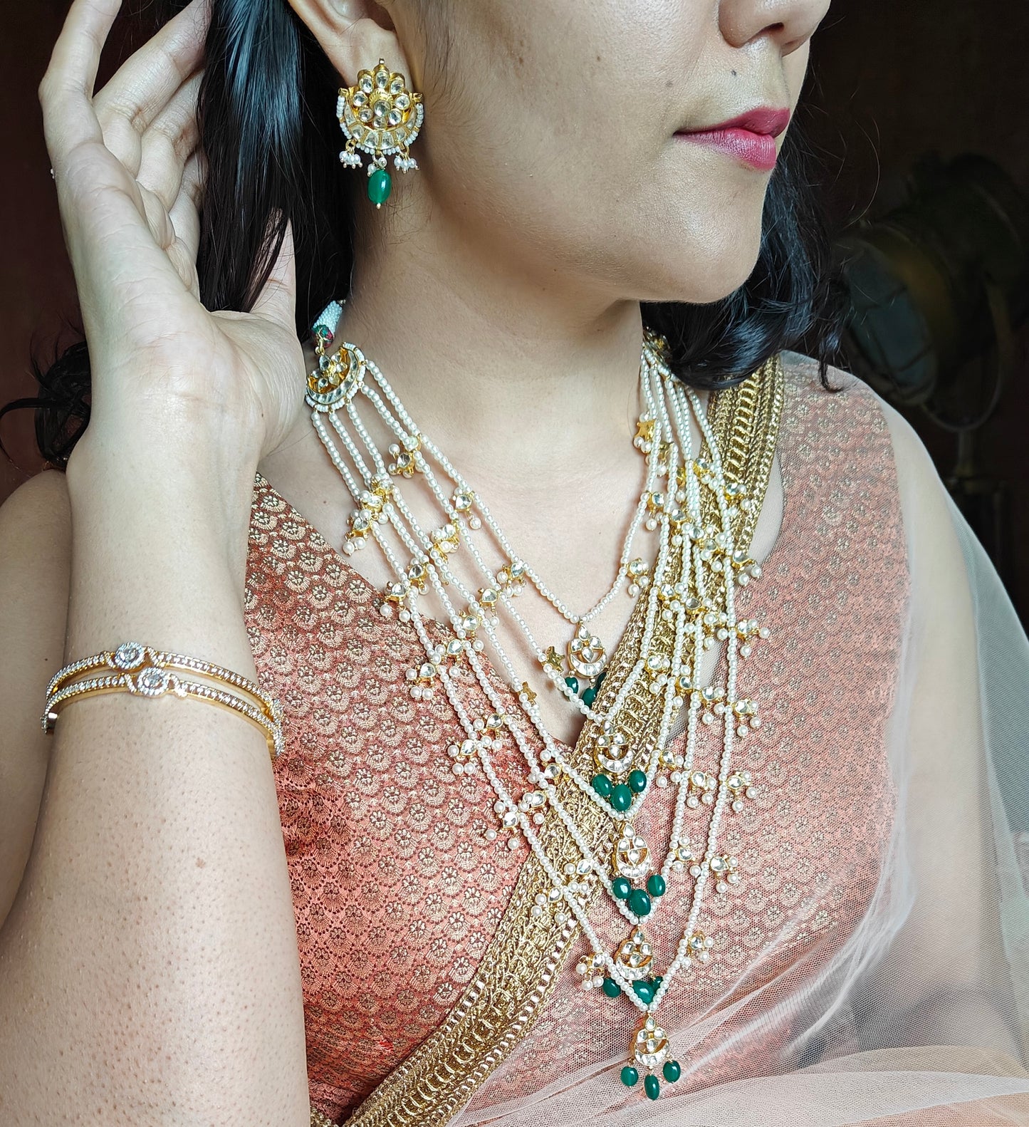 Falguni set with kundan on poth pearl strings