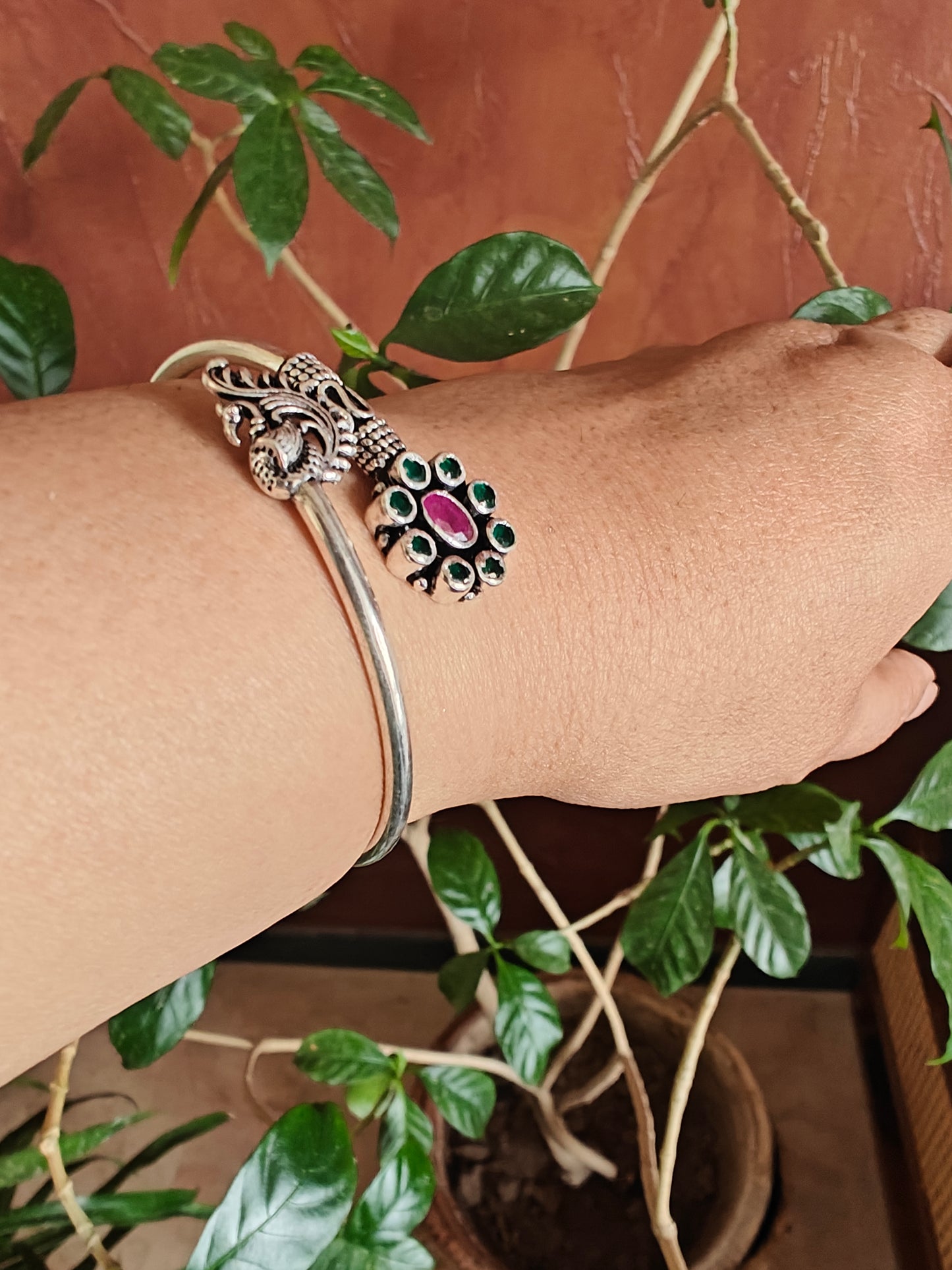 Stuti silver kara(bracelet) with flower and peacock