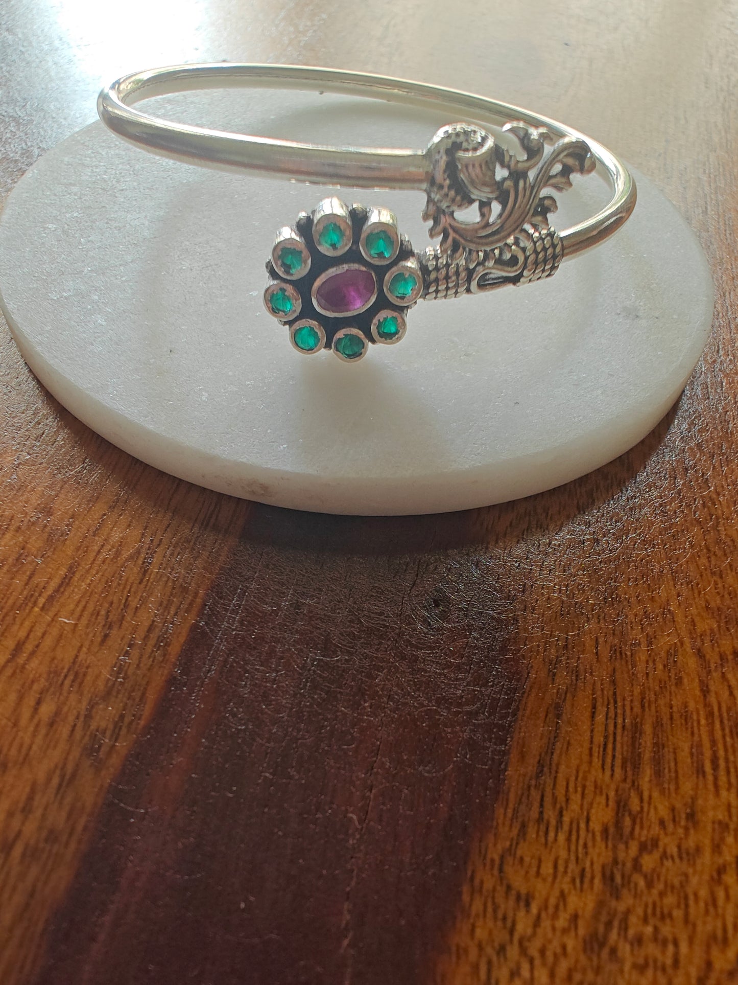 Stuti silver kara(bracelet) with flower and peacock