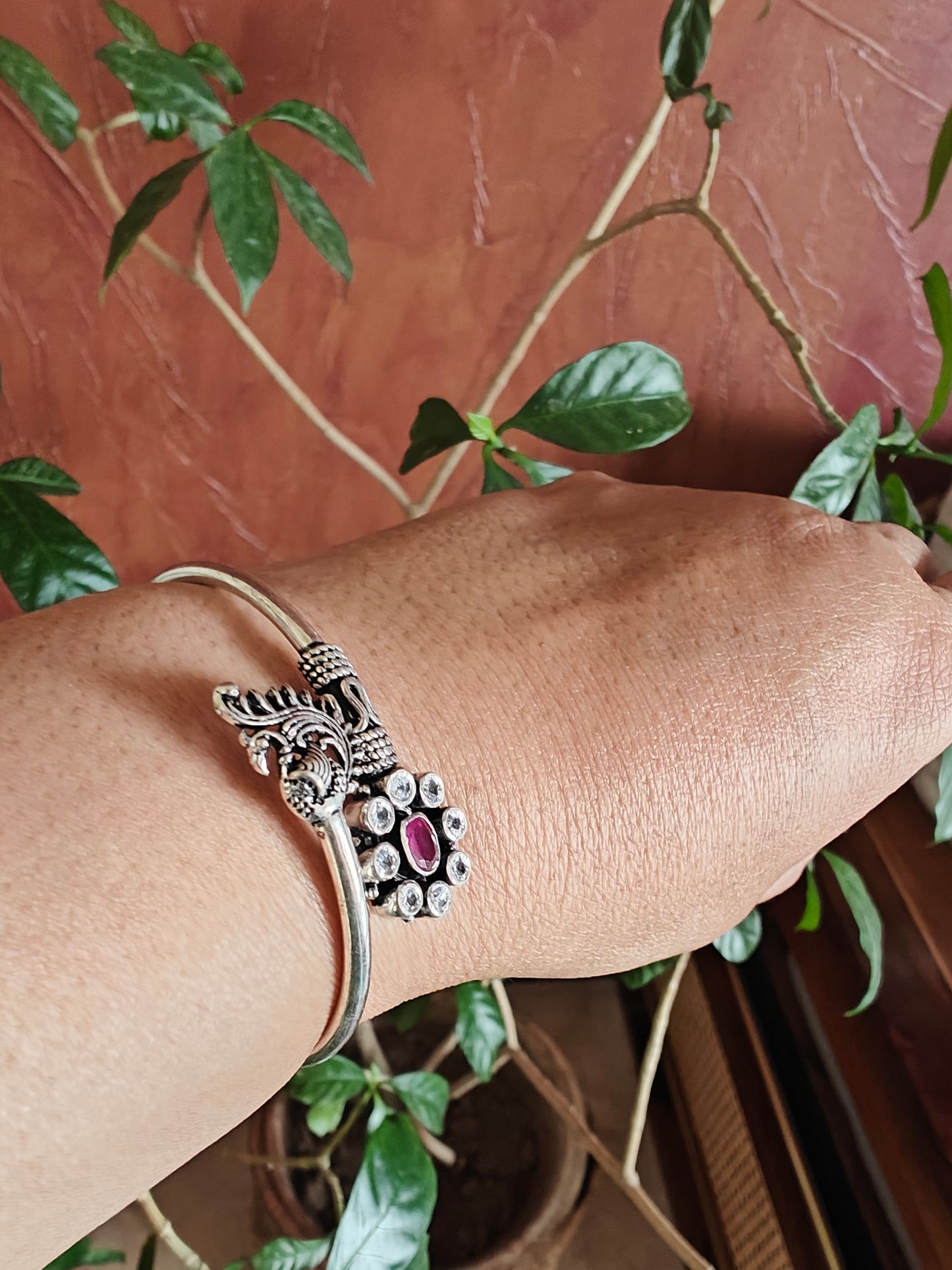 Stuti silver kara(bracelet) with flower and peacock