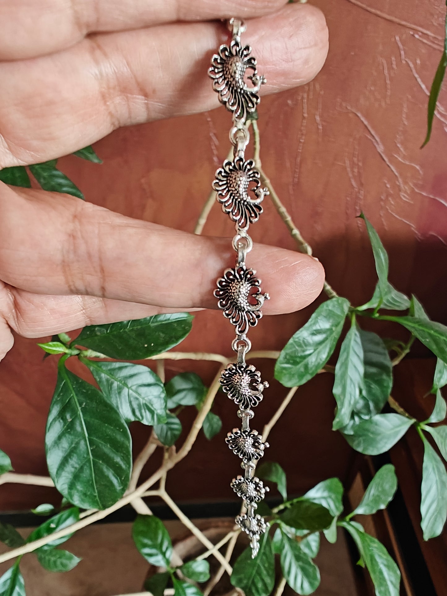 Vritti silver bracelet with peacocks