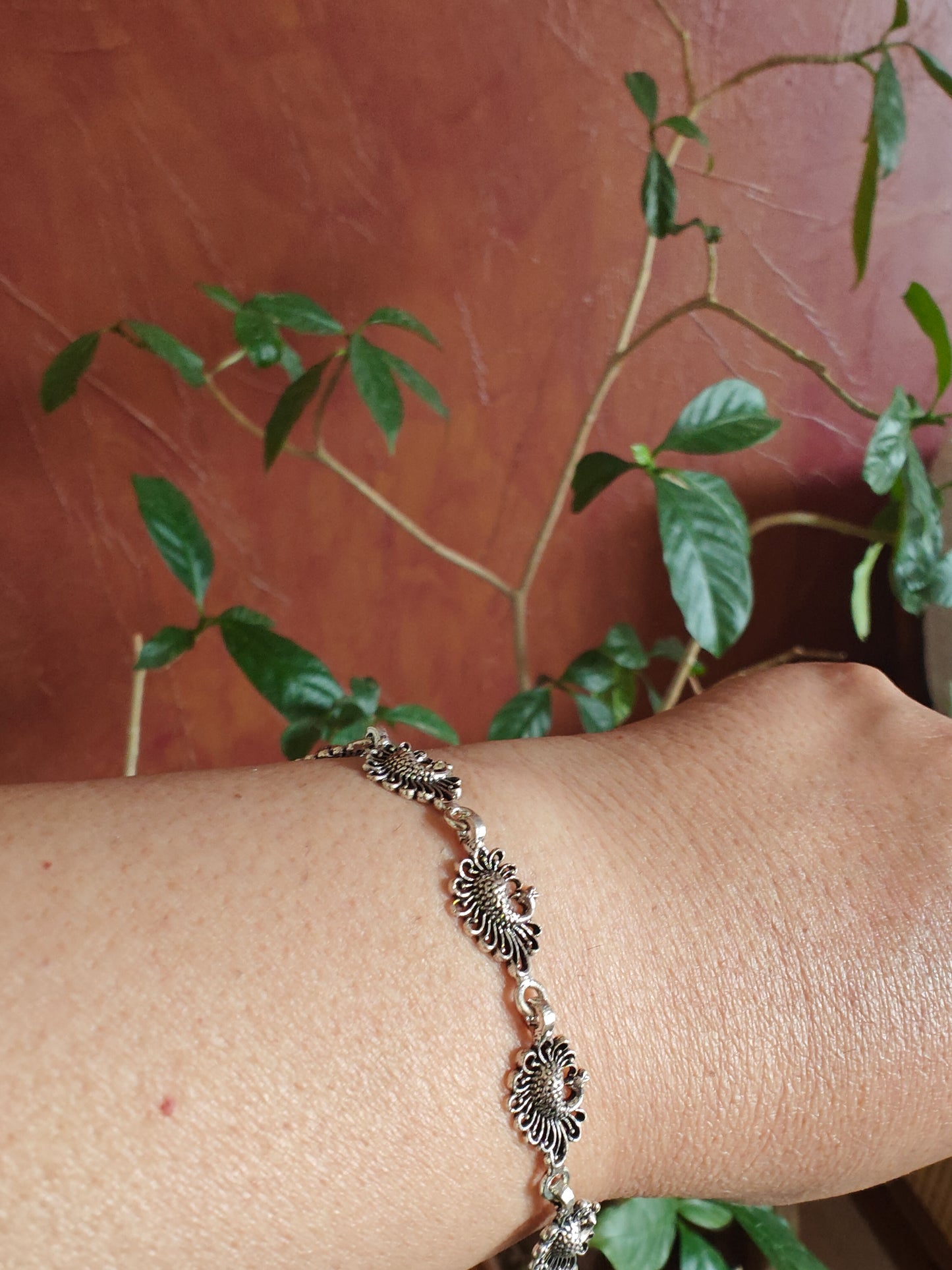 Vritti silver bracelet with peacocks