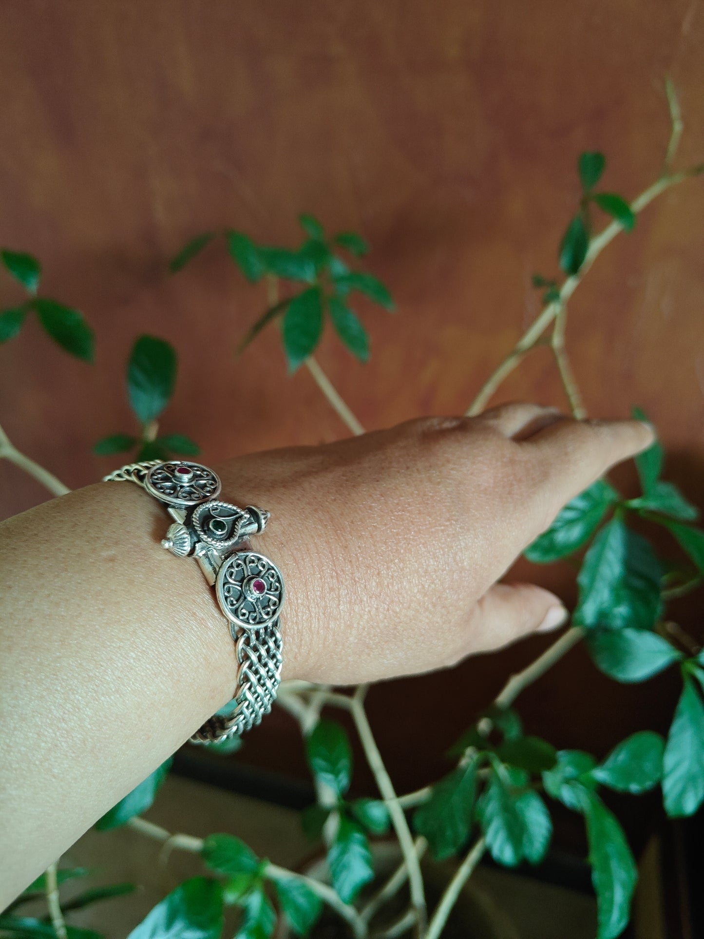 Vrinda kara(bangle)with  circular pieces and paisley motifs