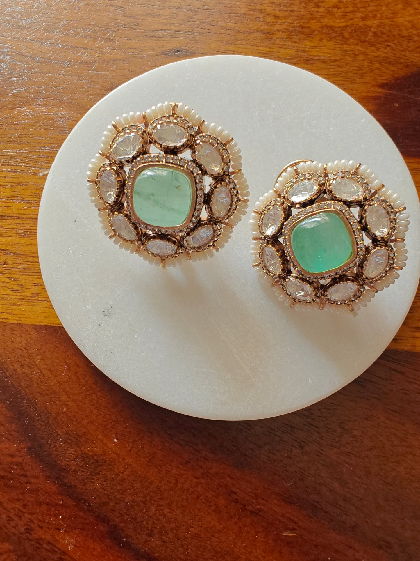 Mint green studs(earrings) with pearls around