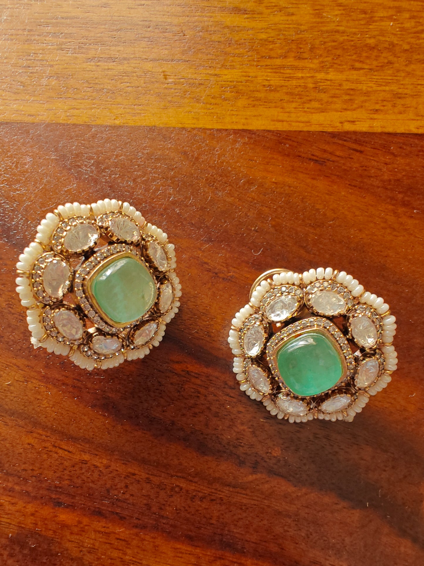 Mint green studs(earrings) with pearls around