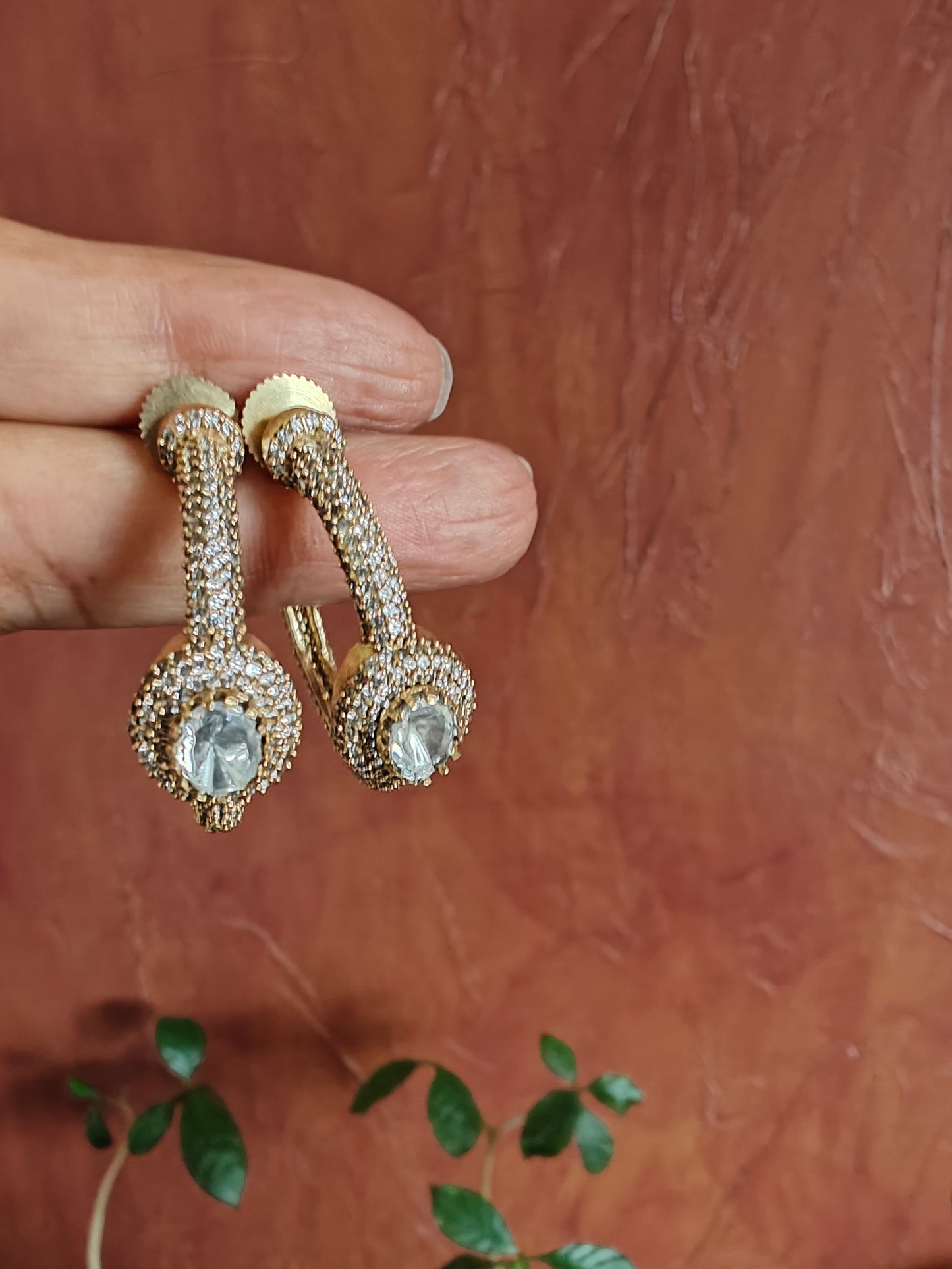 Bali(earrings)with a moissanite surrounded with CZ