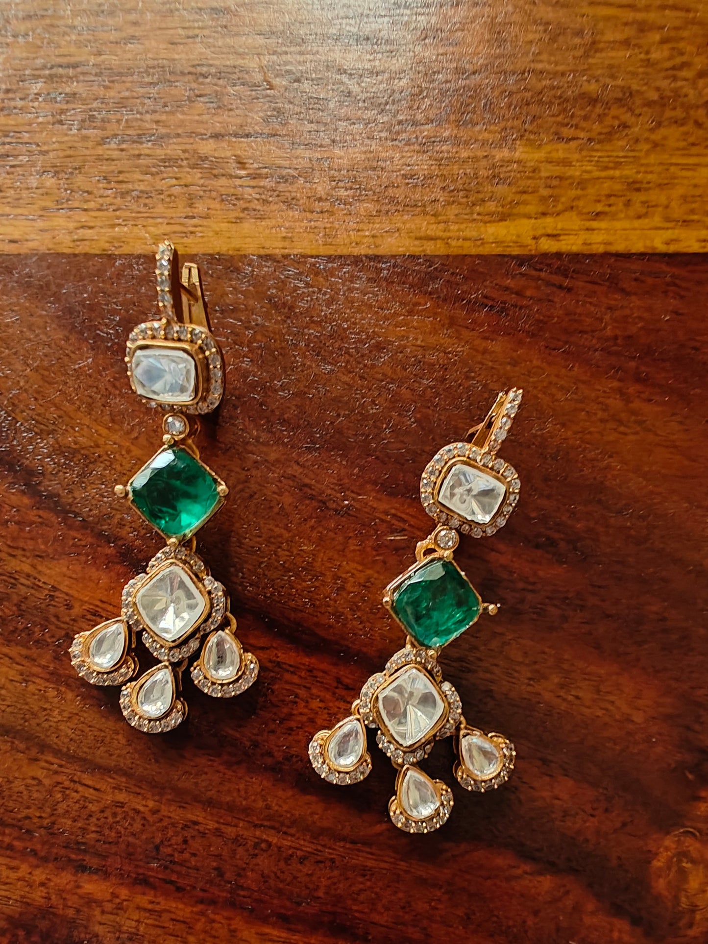 Tabu earrings with moissanite and stone