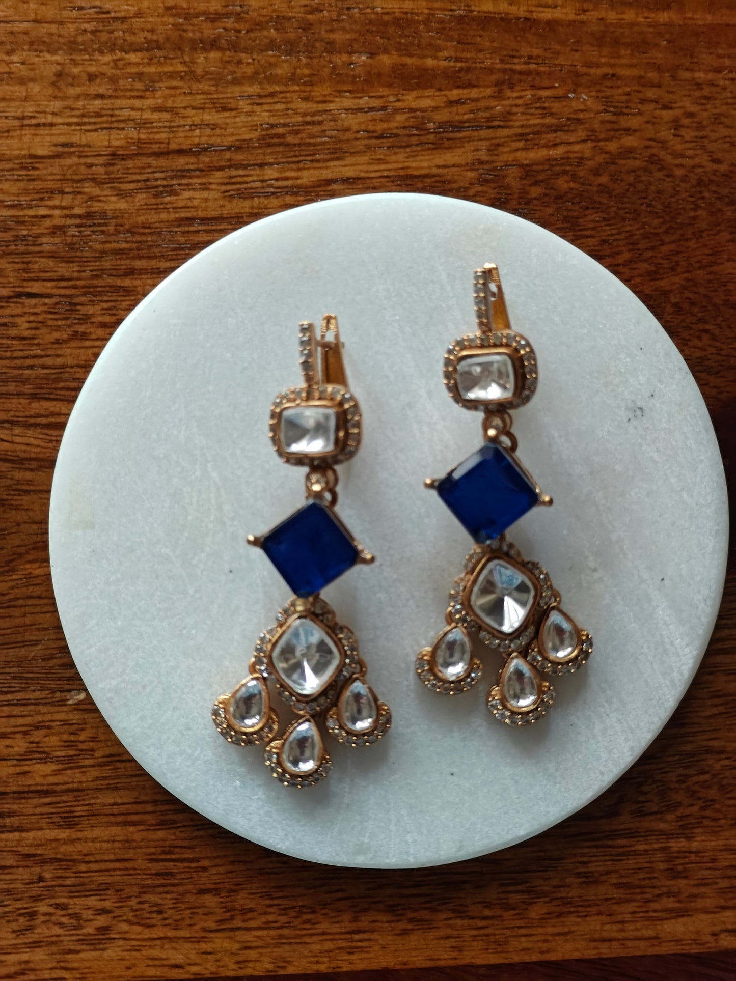 Tabu earrings with moissanite and stone