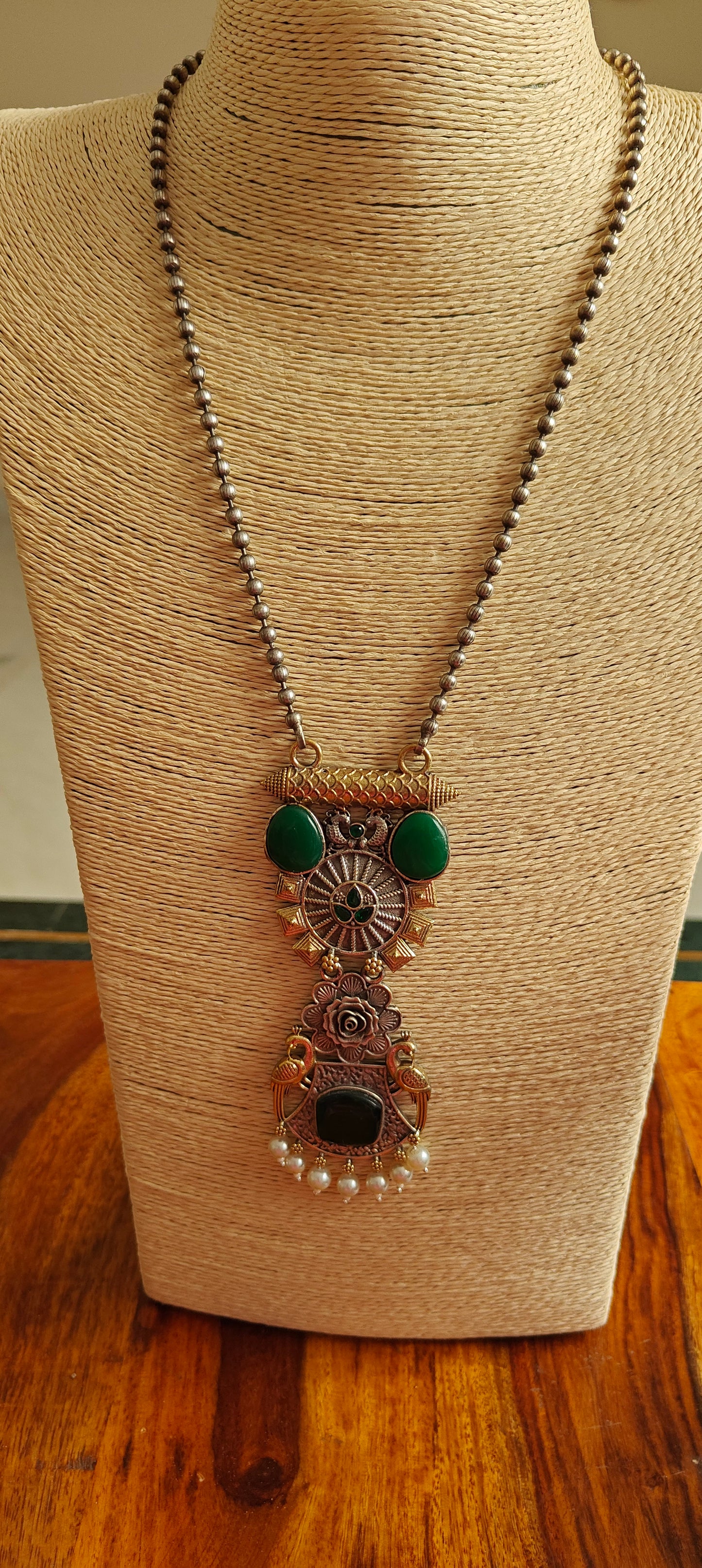 Dual tone set with peacocks and stones