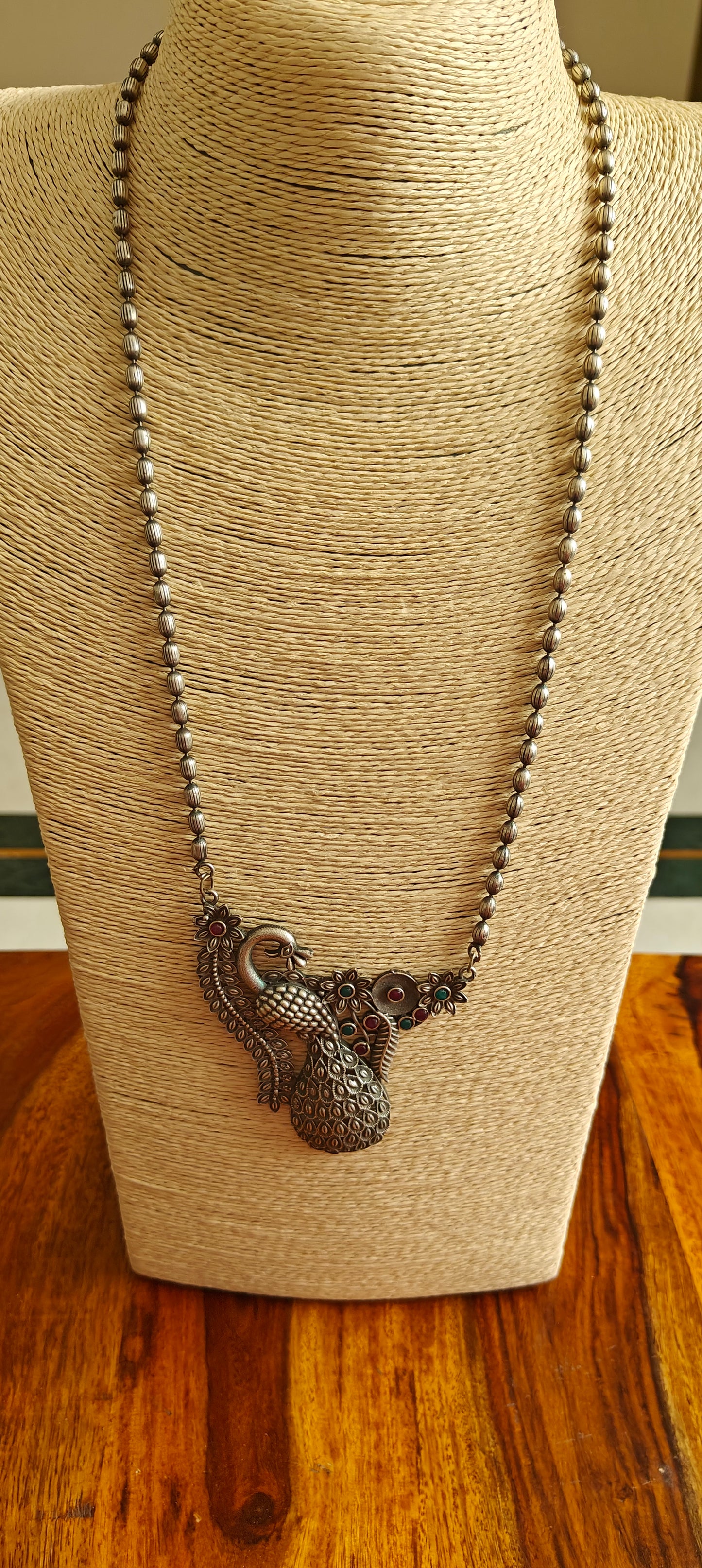 Open peacock necklace